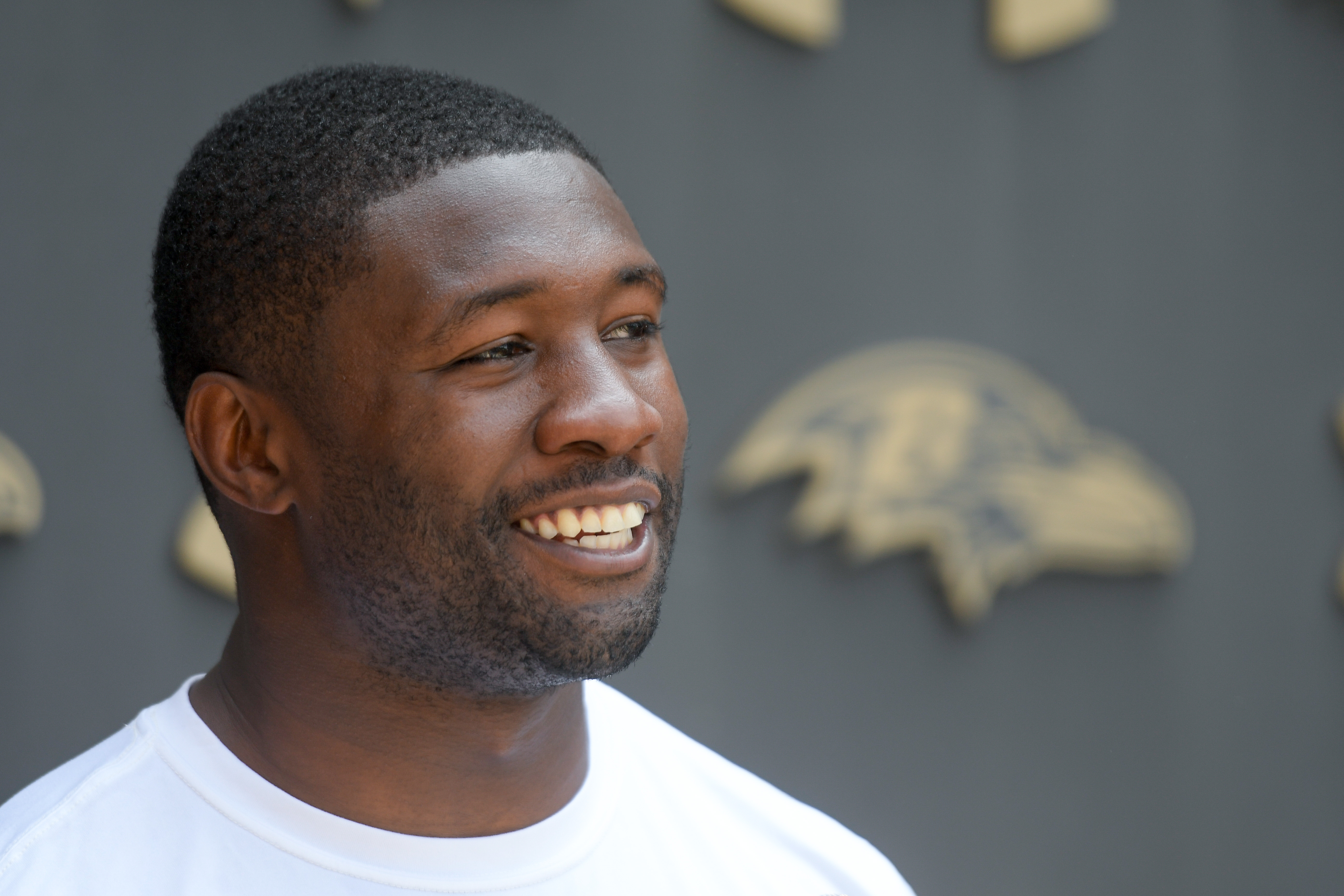 Baltimore Ravens linebacker Roquan Smith (18) runs out of the tunnel during  player introductions before an NFL football game against the Denver  Broncos, Sunday, Dec. 4, 2022, in Baltimore. (AP Photo/Terrance Williams