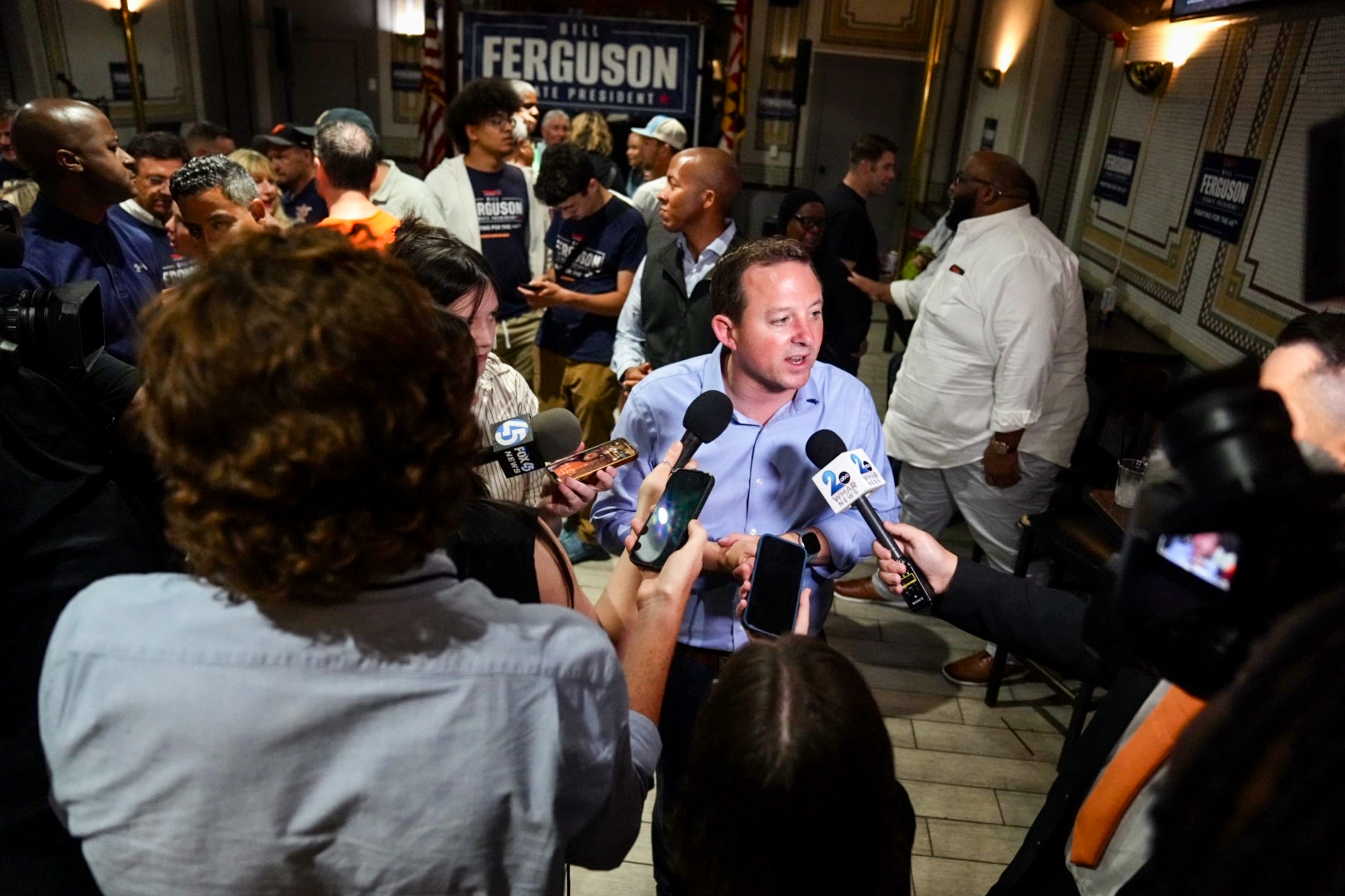 Bill Ferguson is interviewed by reporters following his victory speech at his primary election night watch party at the Firefighters Union Hall in Baltimore on Tuesday evening.
