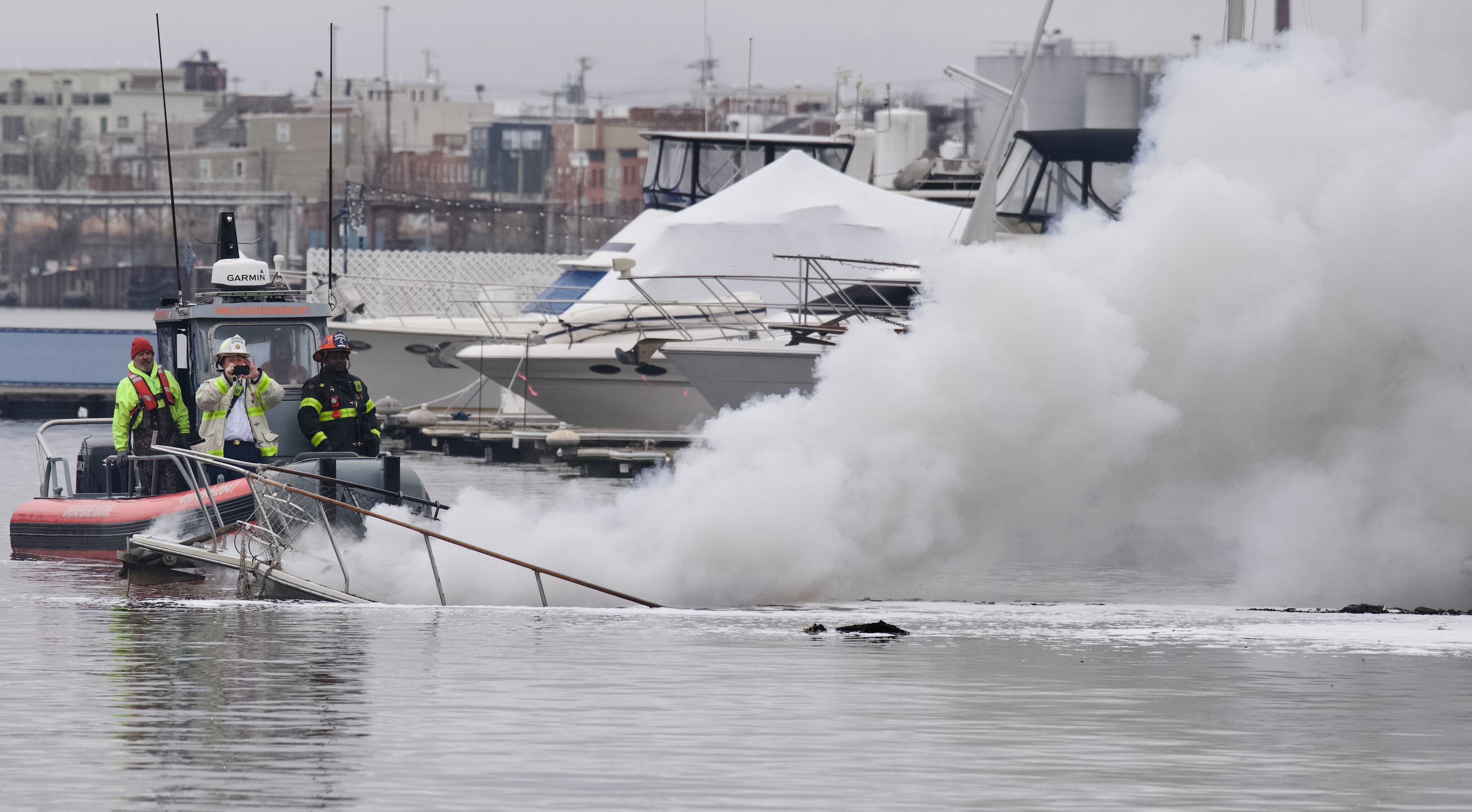 1 boat sinks to bottom of harbor, 2nd burned in fire at Southeast Baltimore  marina - The Baltimore Banner