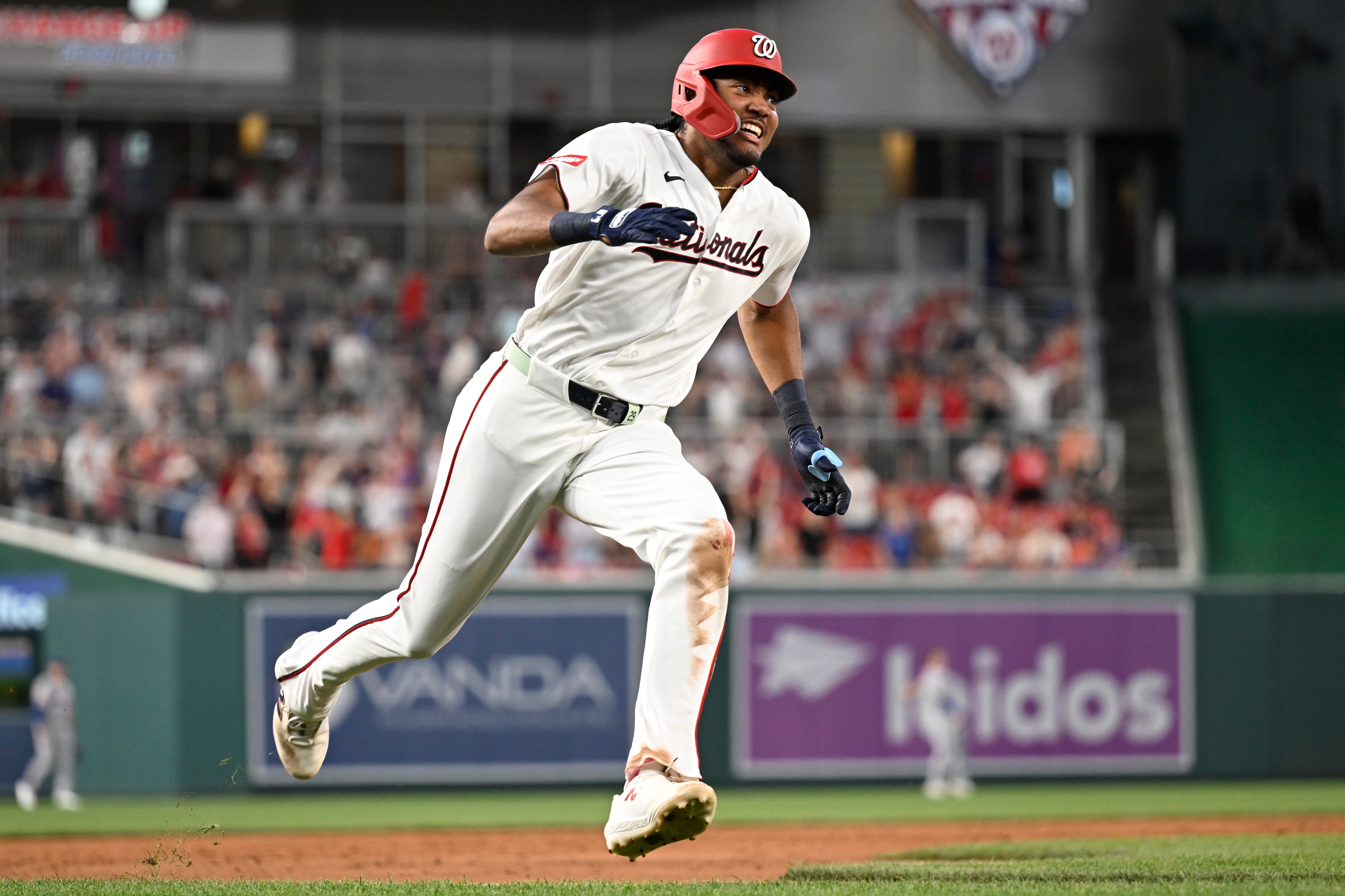 Washington Nationals' James Wood races around the bases on an inside-the-park grand slam during a baseball game against the New York Mets, Tuesday, May 19, 2026, in Washington.