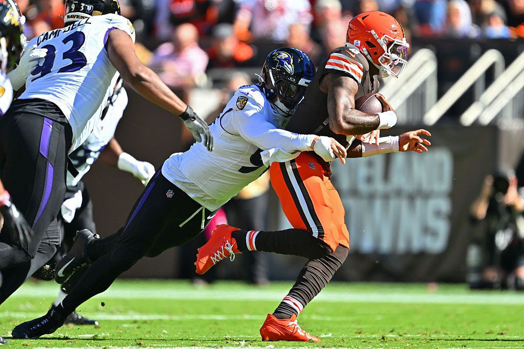 Ravens outside linebacker Trey Hendrickson sacks Cleveland Browns quarterback Deshaun Watson during the first quarter.