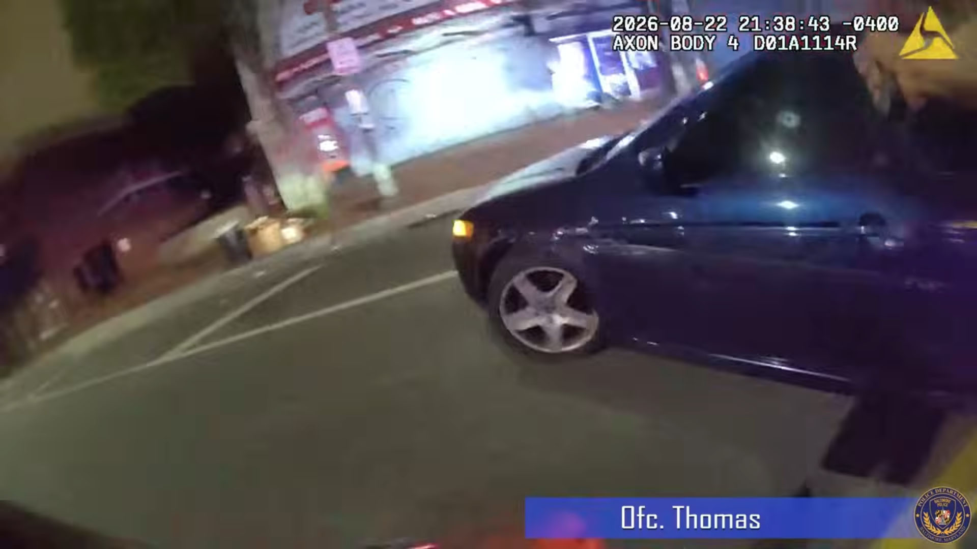 Body camera footage shows Baltimore officer struck by car before shooting driver