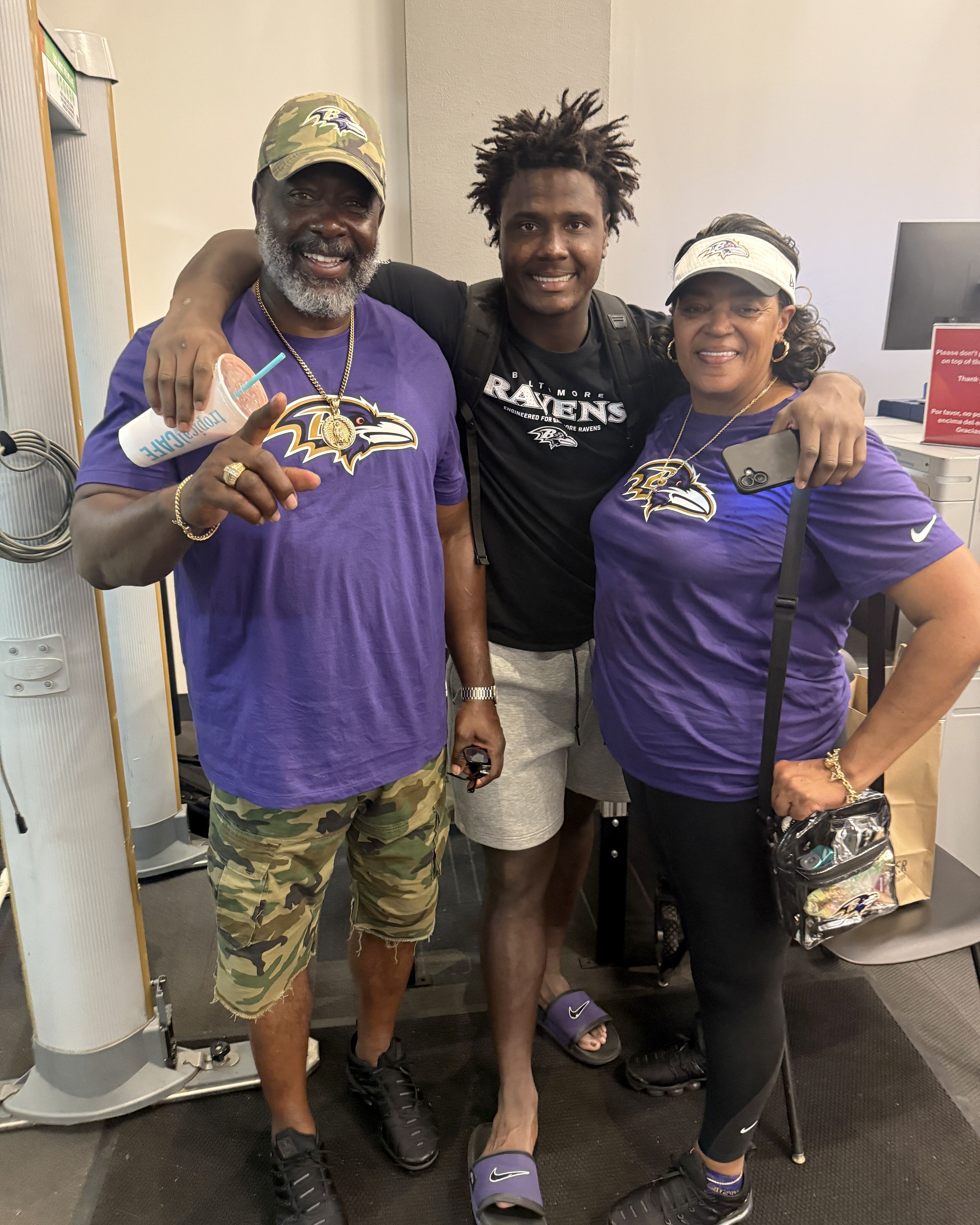 Zion Young, center, with his parents Frank Young and Shirley Reese after Zion's first preseason Ravens game against the Philadelphia Eagles.