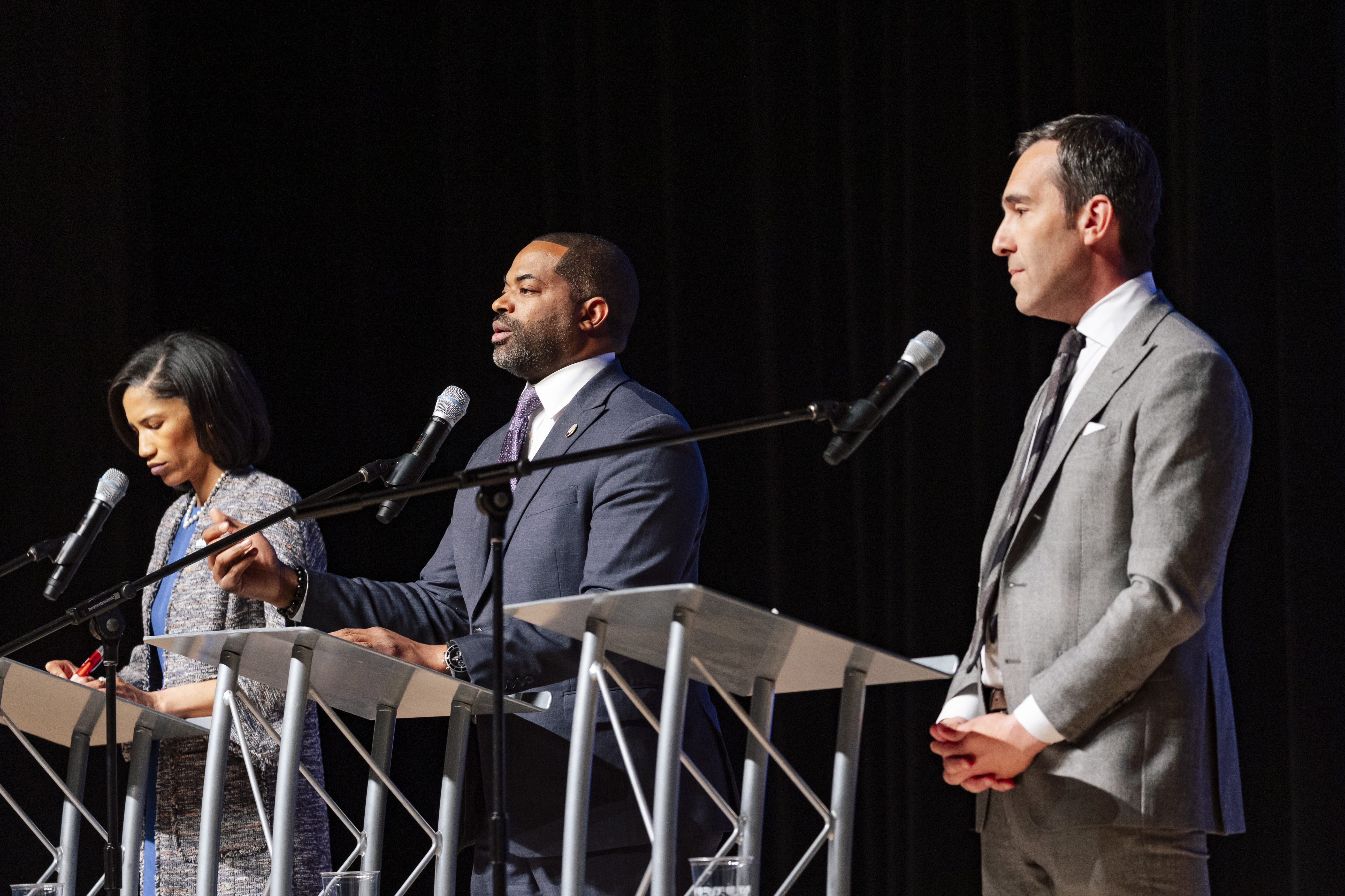 Baltimore City Council President Nick Mosby, center, Shannon Sneed, left, and Zeke Cohen during a televised debate hosted by WBAL in Morgan State University's Murphy Fine Arts Center on Wednesday, April 17, 2024 in Baltimore, MD. (Wesley Lapointe/ for the Baltimore Banner)