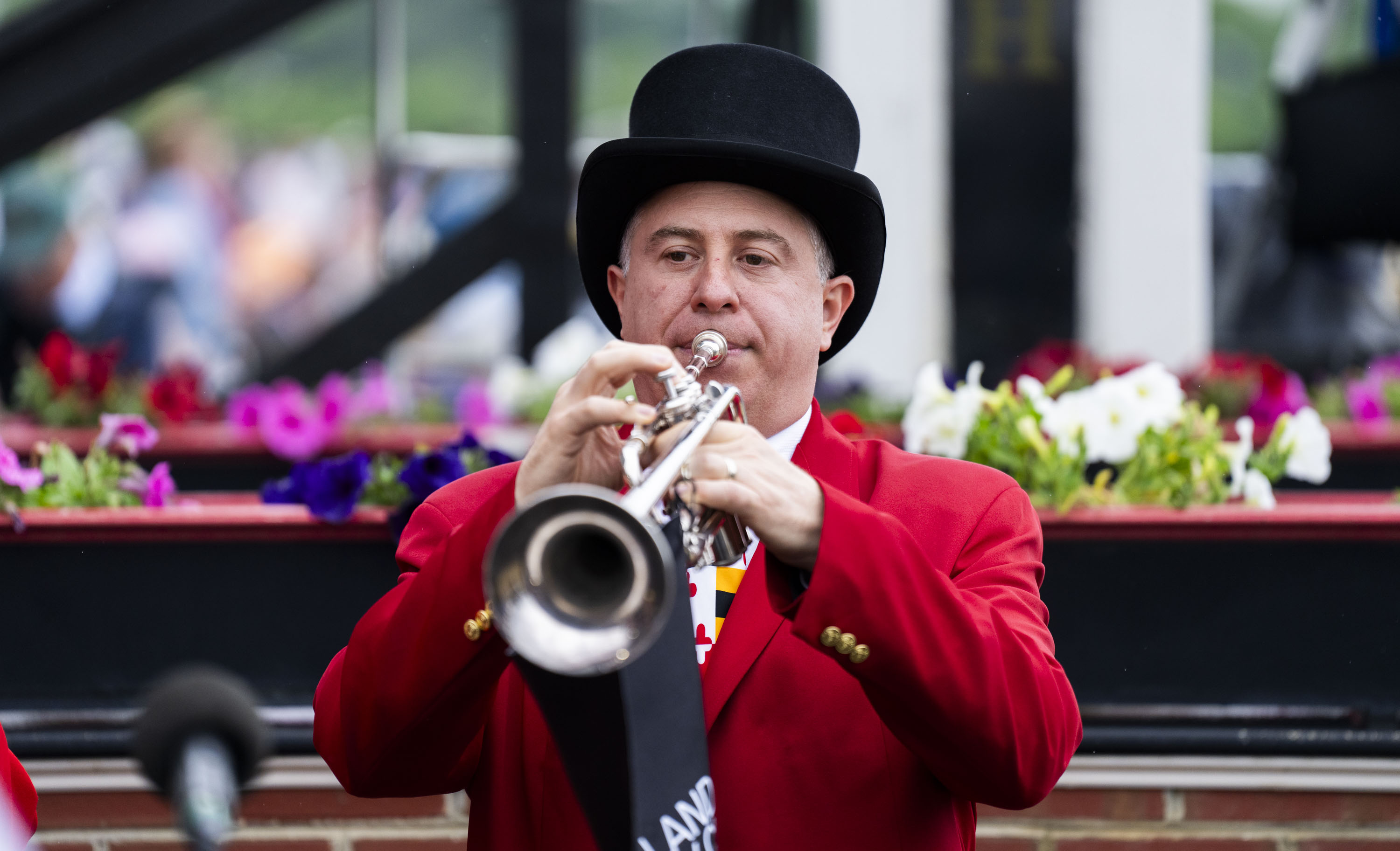 Justin Nurin plays the bugle. (Kaitlin Newman/The Baltimore Banner)