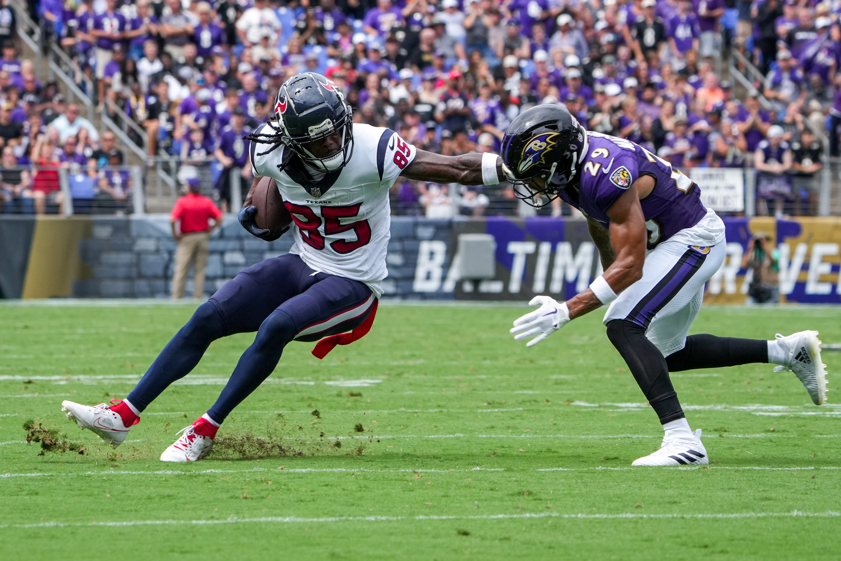 Baltimore Ravens safety Ar'Darius Washington (29) walks off the