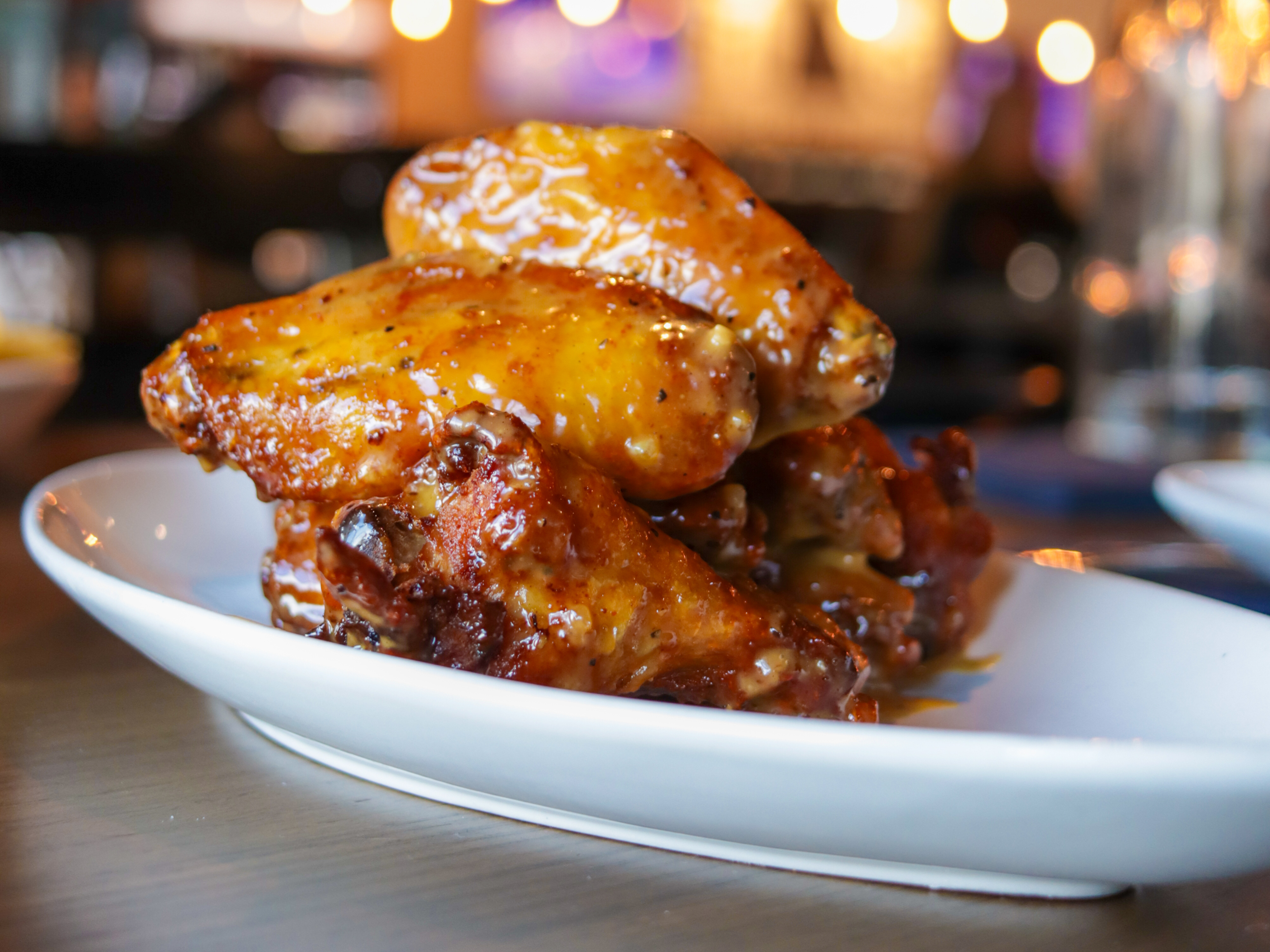 The Wet Honey Lemon Pepper wings from Black Flag Social House.