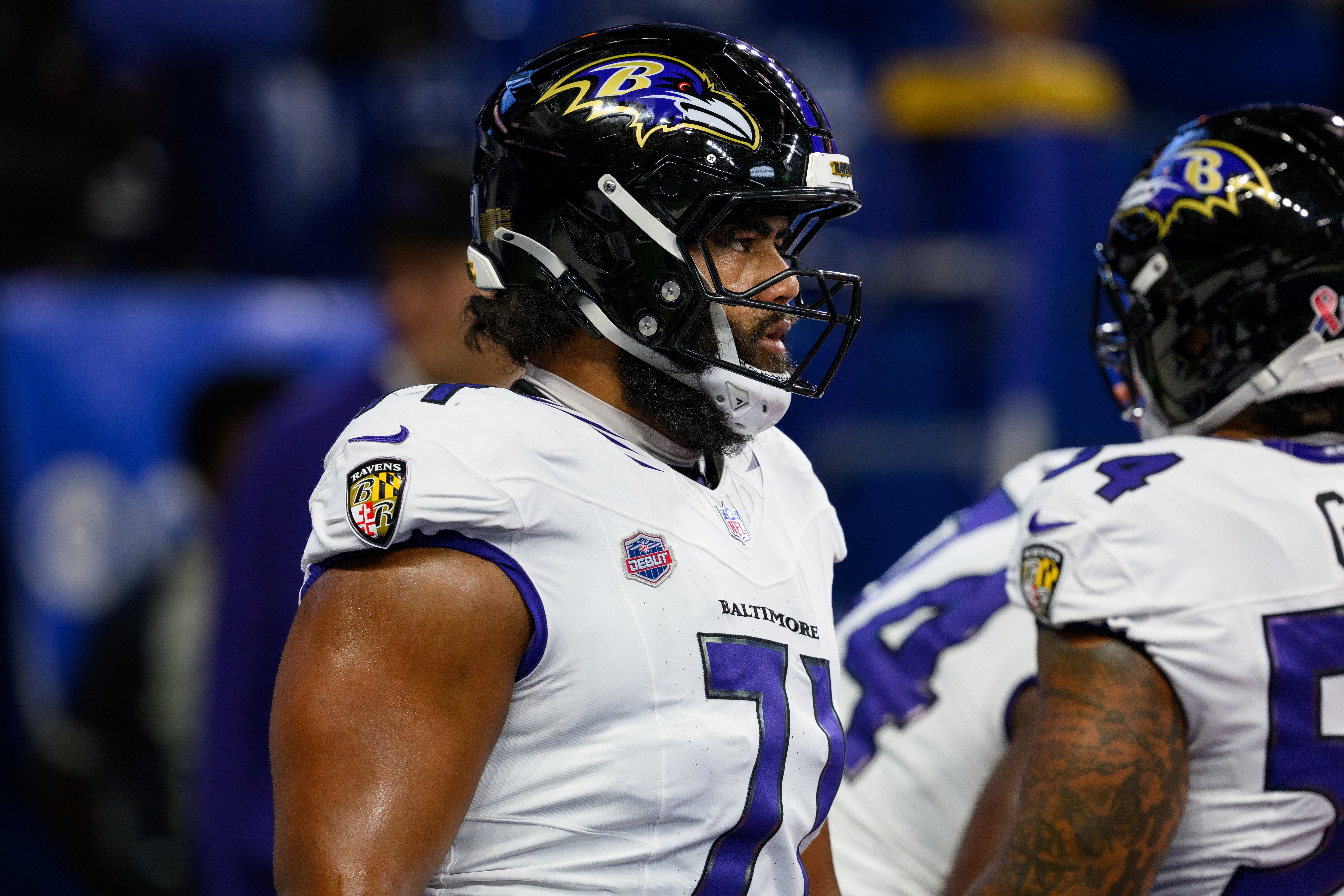 Ravens rookie offensive lineman Vega Ioane warms up prior to the team's Week 1 game against the Indianapolis Colts.