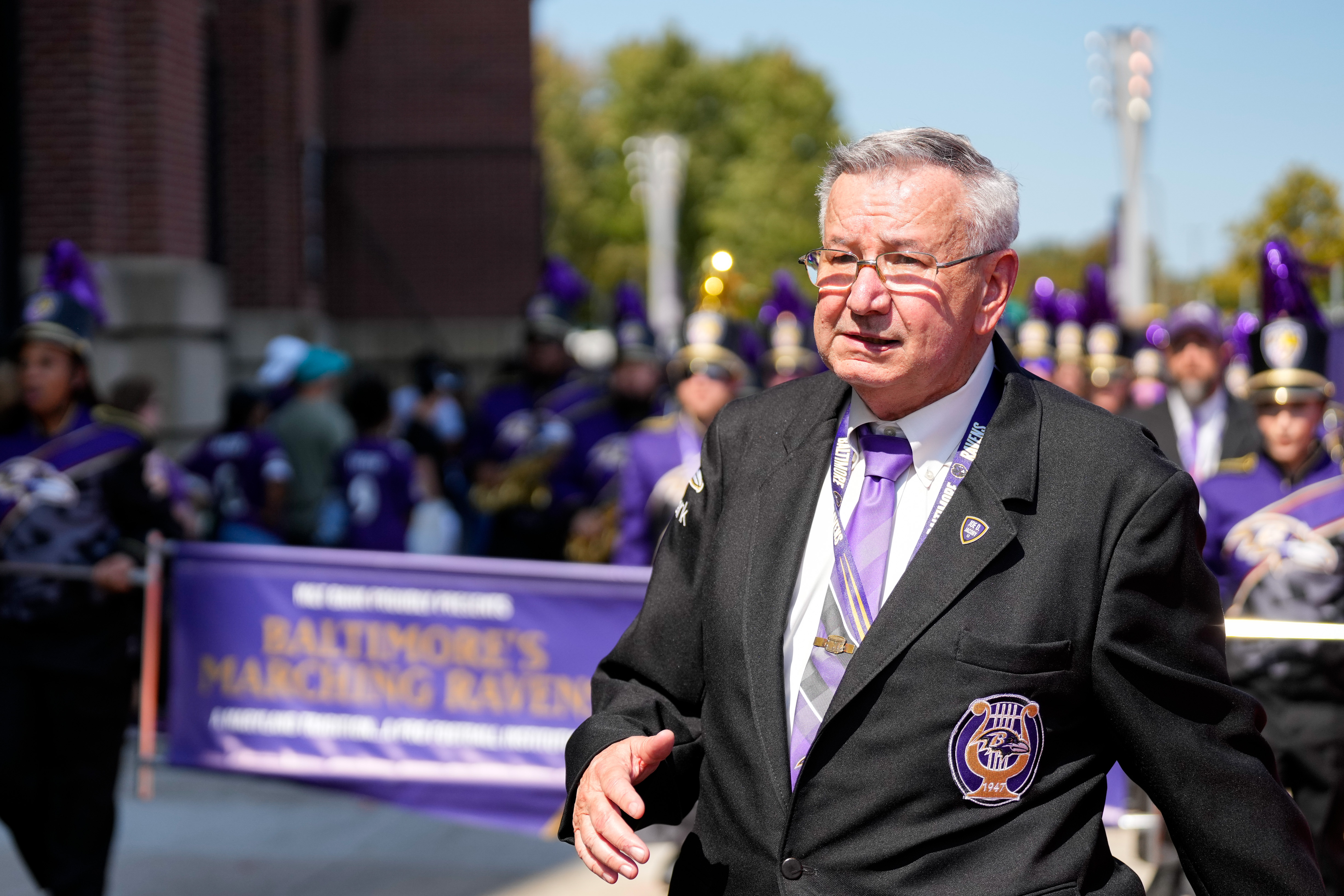 John Ziemann, president of Baltimore’s Marching Ravens, marches with the band ahead of the Baltimore Ravens’ home opening game against the Las Vegas Raiders at M&T Bank Stadium in Baltimore on Sunday, September 15, 2024.