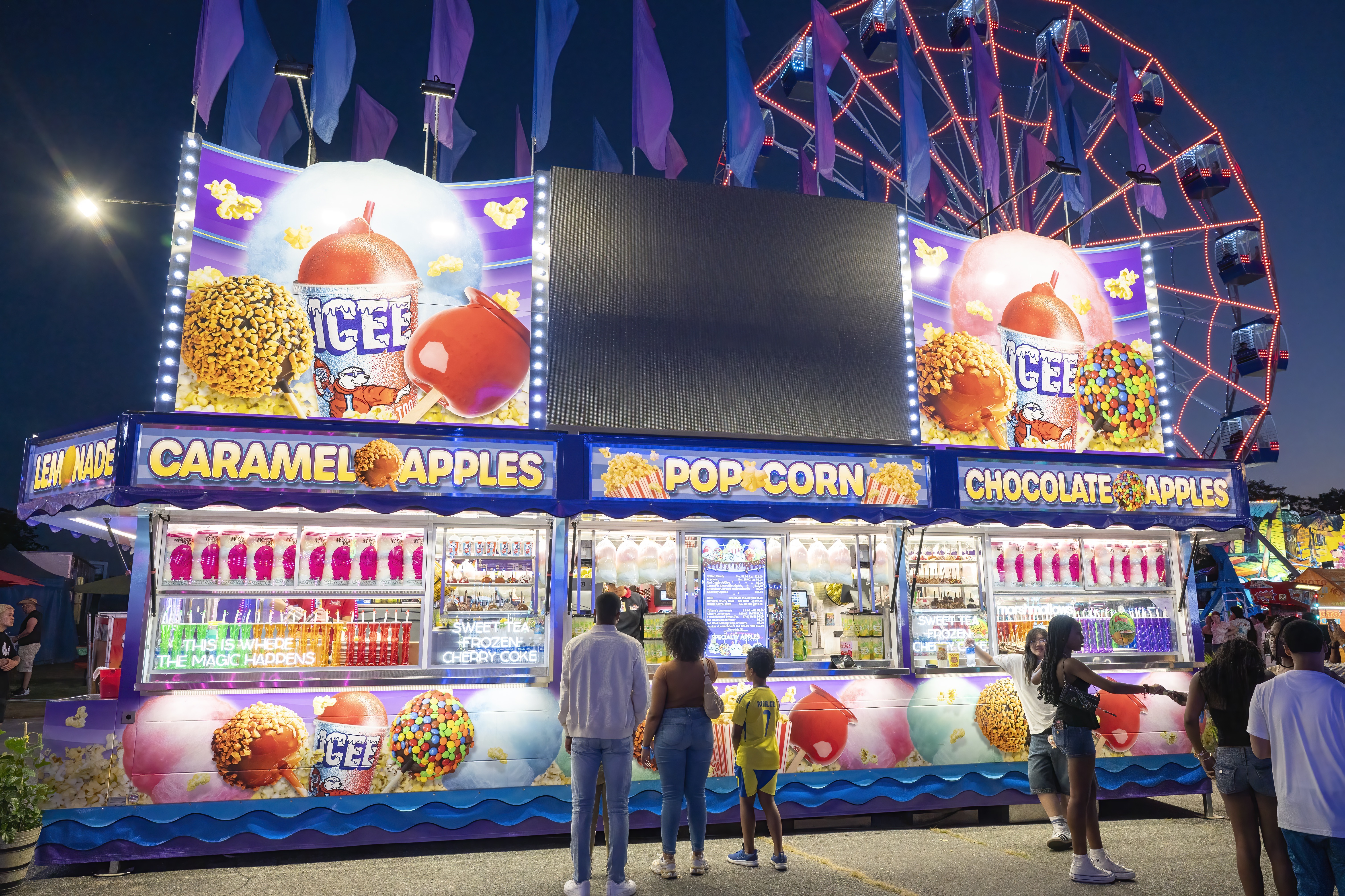 Menu highlights this year include crabby fries, Krispy Kreme burgers and the return of a New Orleans-style food booth.