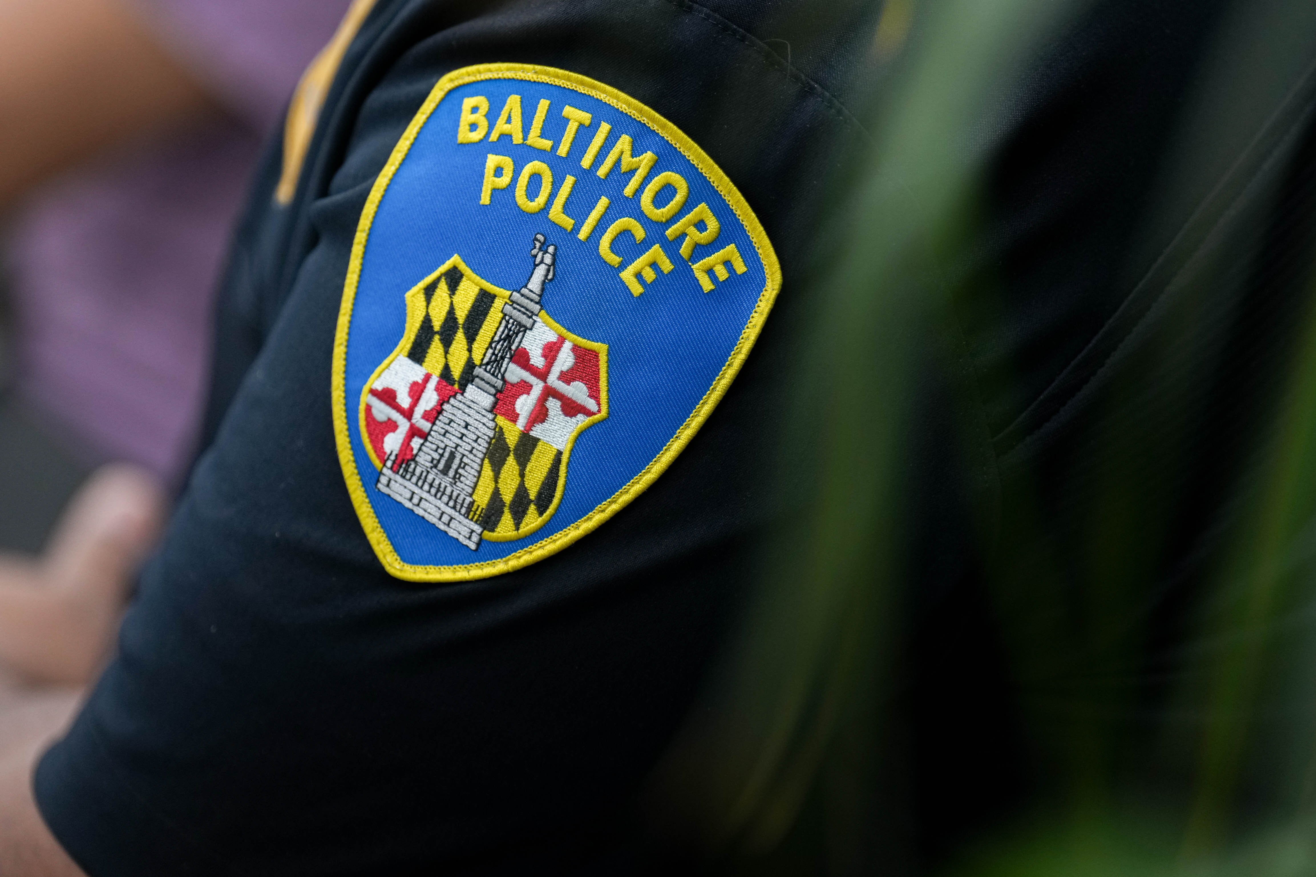 Off-duty Baltimore Police officer shot while defending woman, court records show