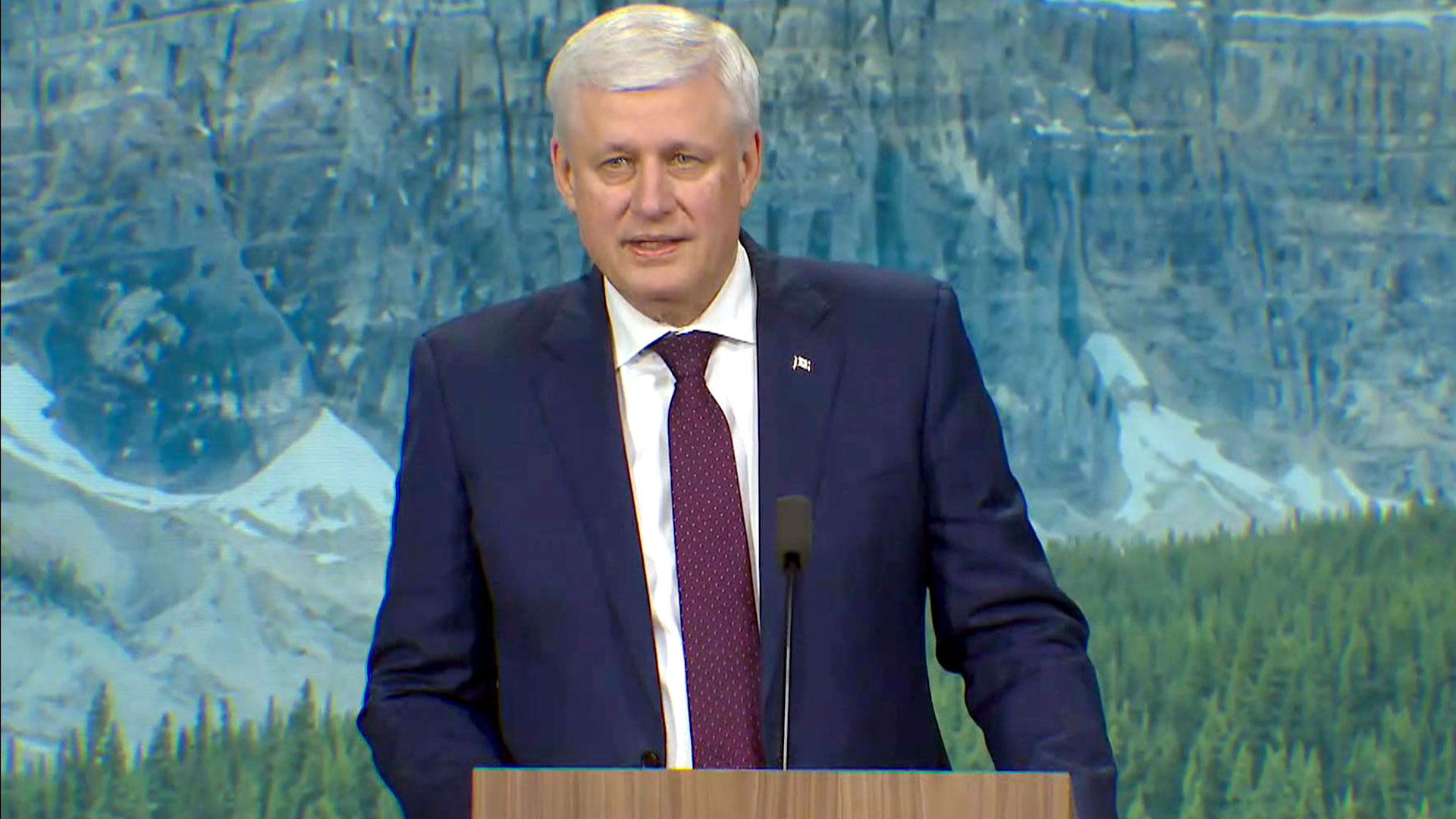 Former PM Harper addresses Trump, Canadian sovereignty in summit speech. Live updates here.