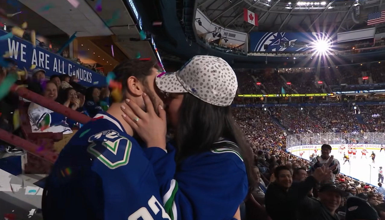 Fan proposes during Canucks game 