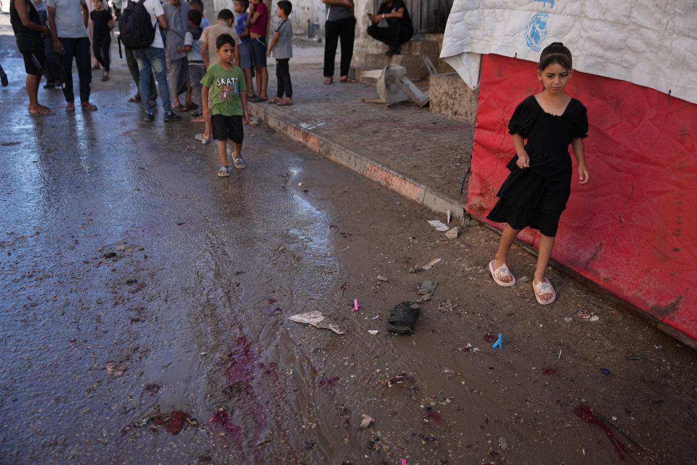 An Israeli strike on a funeral in Gaza kills 7 people and wounds 22, a local hospital says