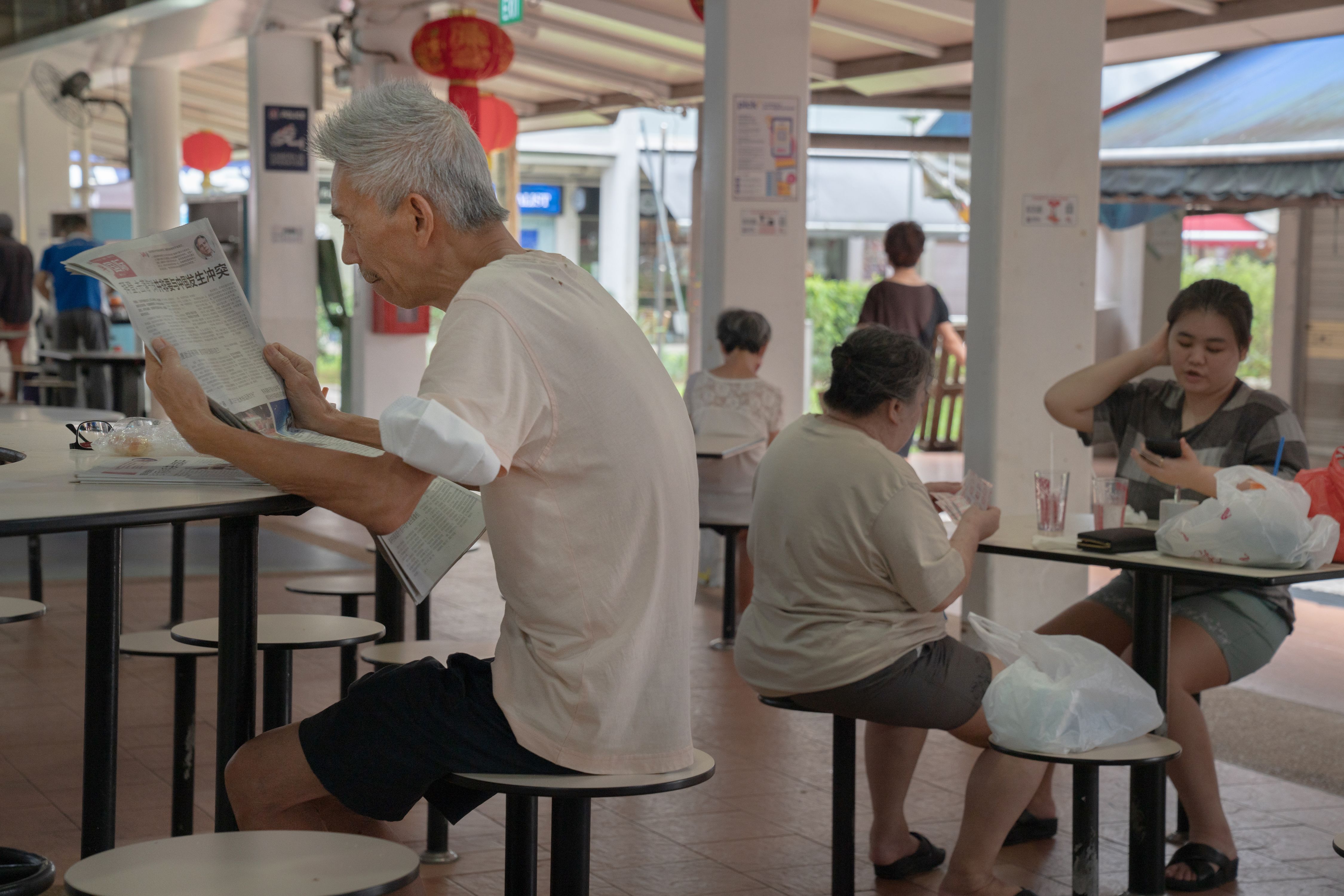 This country is paying its people to read. Can it stop brain rot?