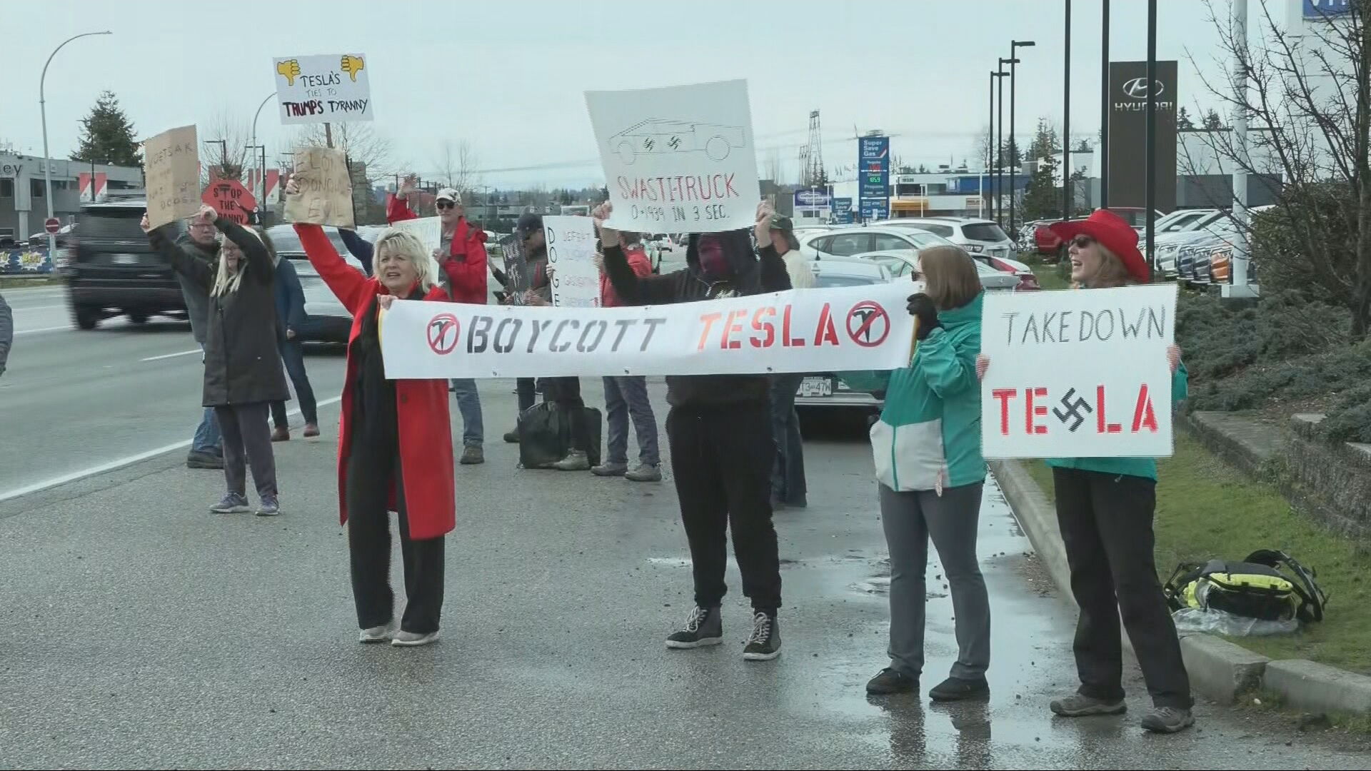 ‘Tesla Takeover’ protest in B.C.’s Langley takes aim at Elon Musk 