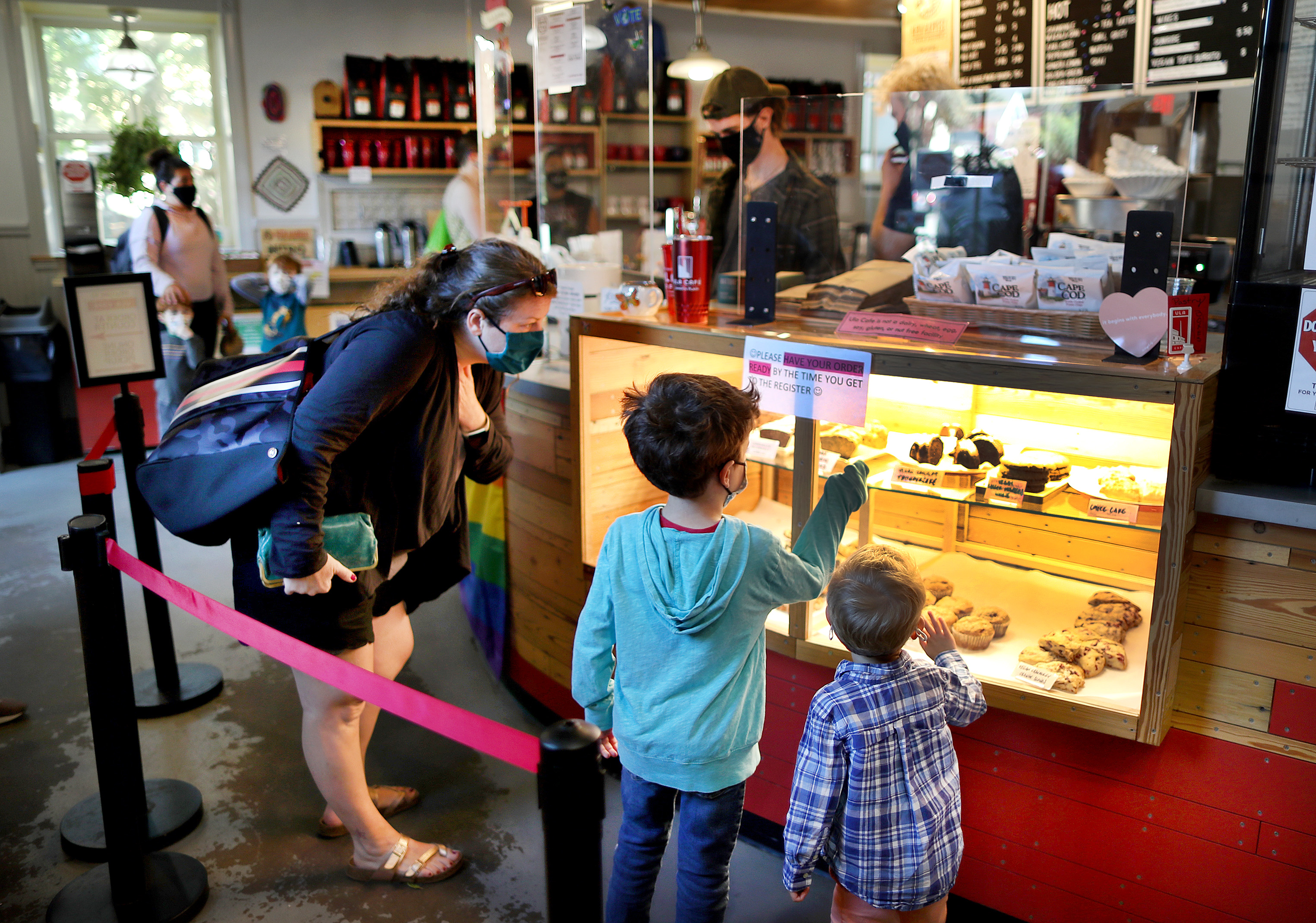 At Ula Cafe, which sells classic fare like pastries and coffee, a pay-it-forward wall allows customers to buy food that can later be claimed by total strangers.