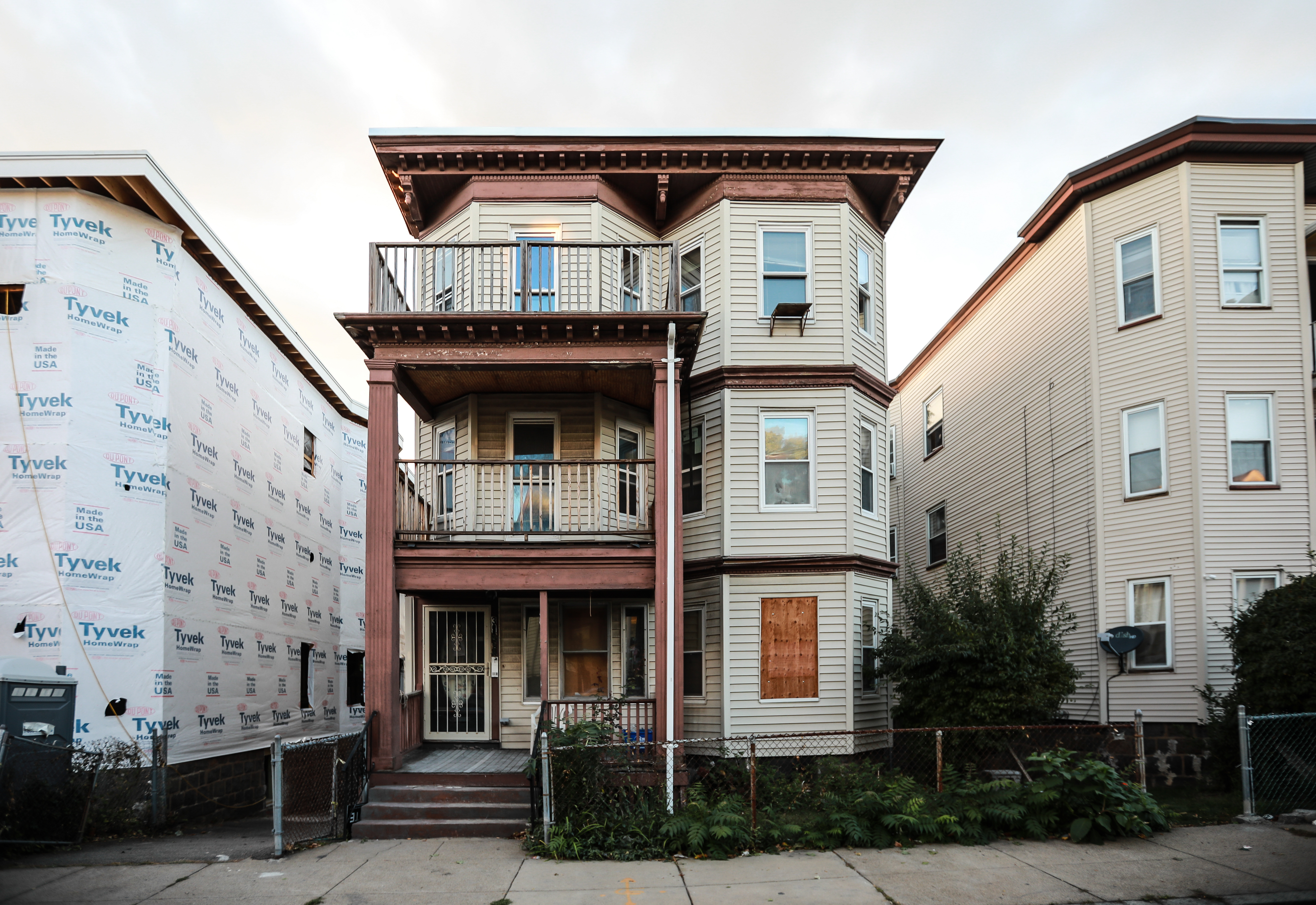 A triple-decker renovation-in-progress in Dorchester. The finished project will be featured on “This Old House” next month.