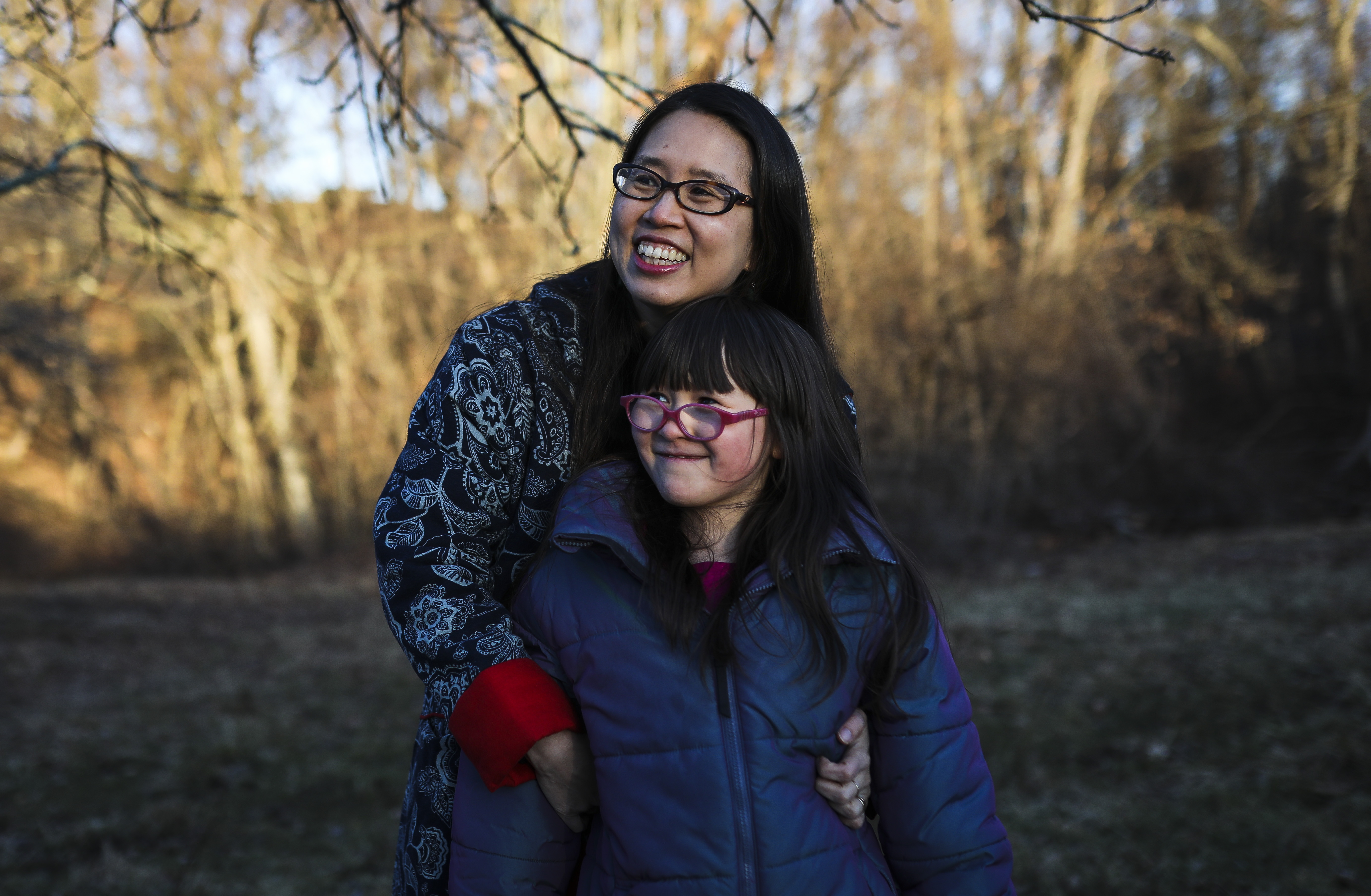 Grace Lin stood with her daughter, Hazel, near their home in Northampton. The main character from “A Big Mooncake for Little Star” (2018) was modeled on Hazel.
