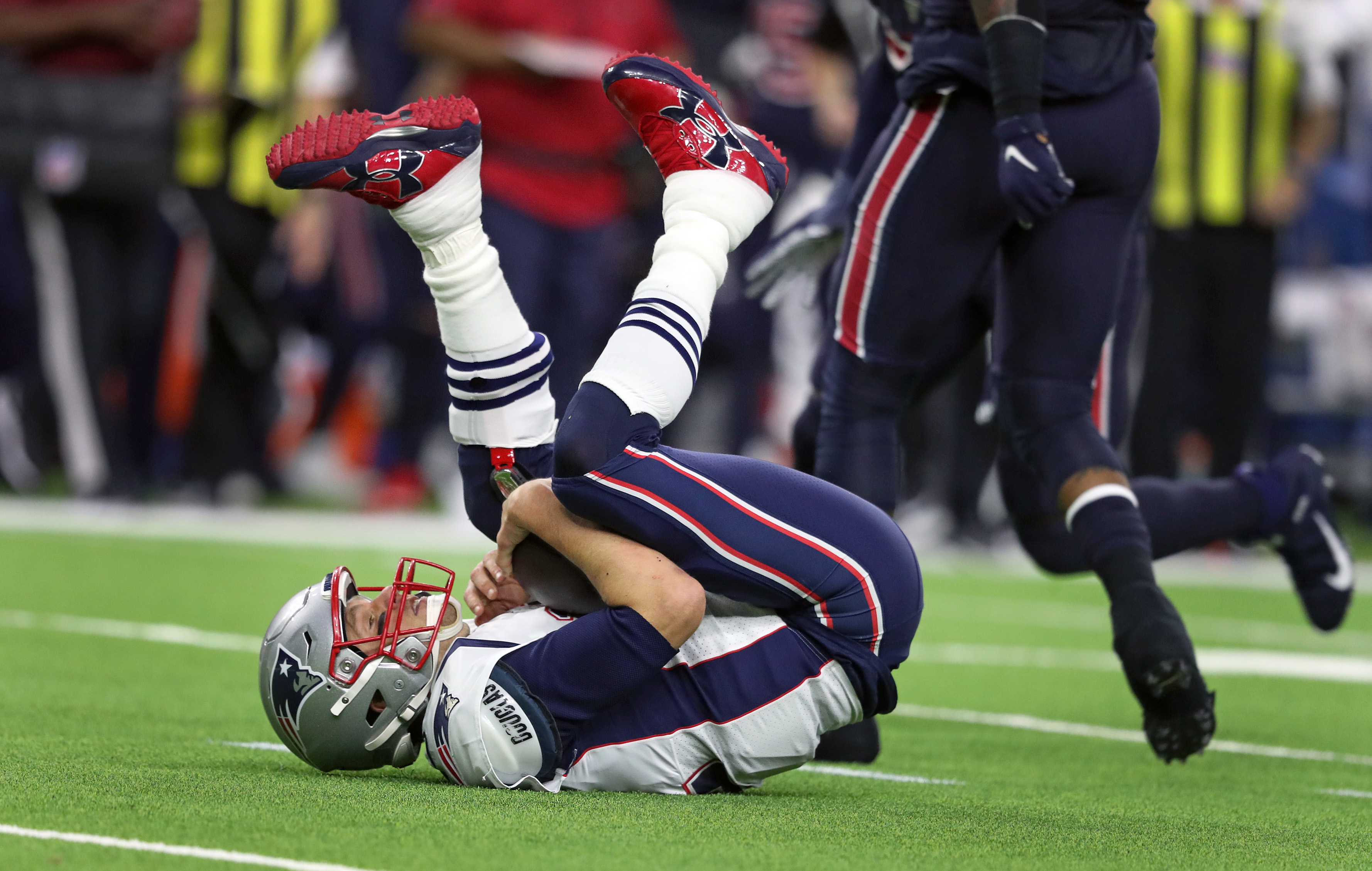 Quarterback Tom Brady was on his back with the football after being sacked in the third quarter of the Patriots’ 28-22 loss to the Texans at NRG Stadium in Houston on Dec. 1.