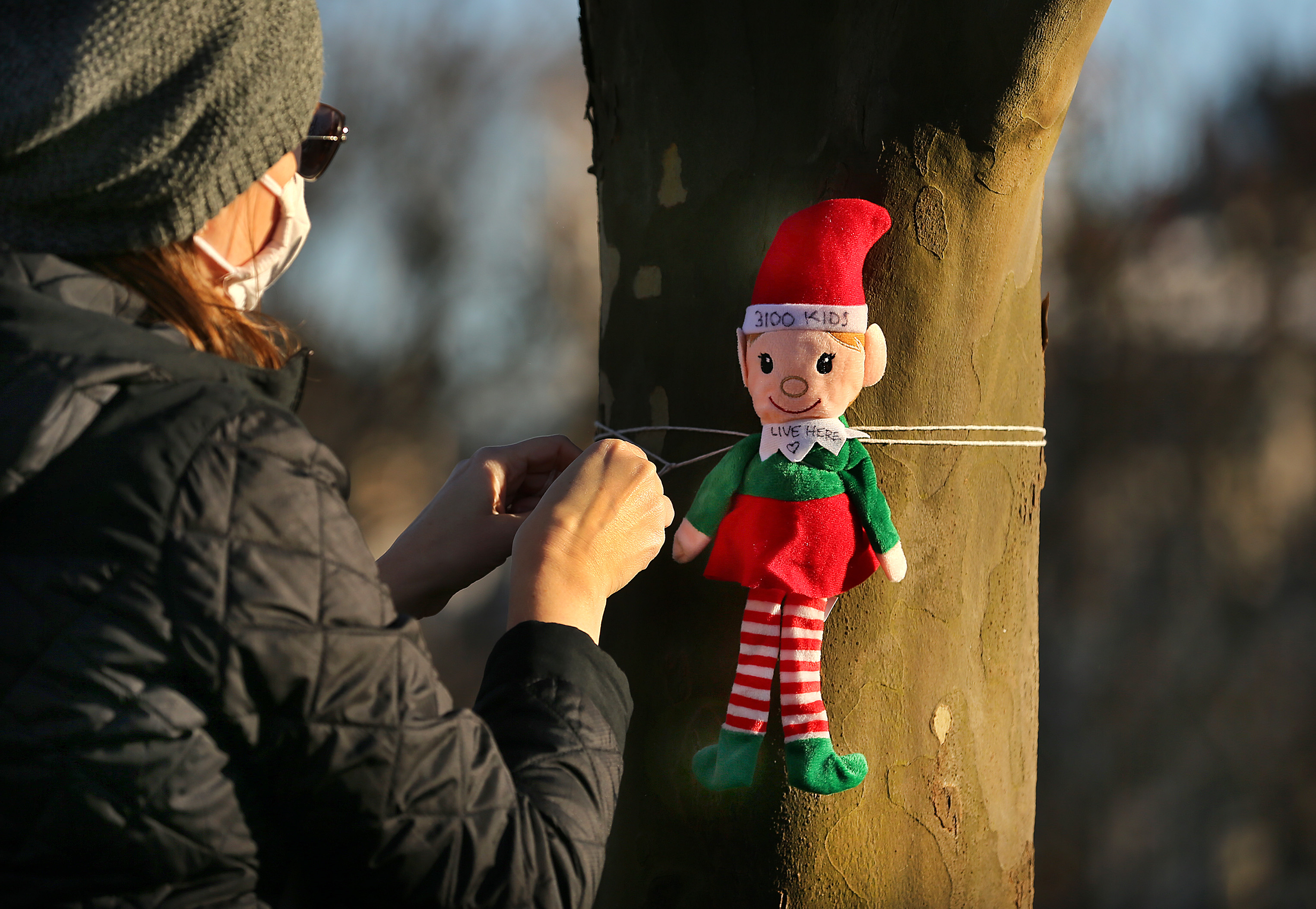 In early December, Andrea Honore from Weymouth attached an elf to a tree overlooking the facility. The elves represent the 3,100 children who live nearby.