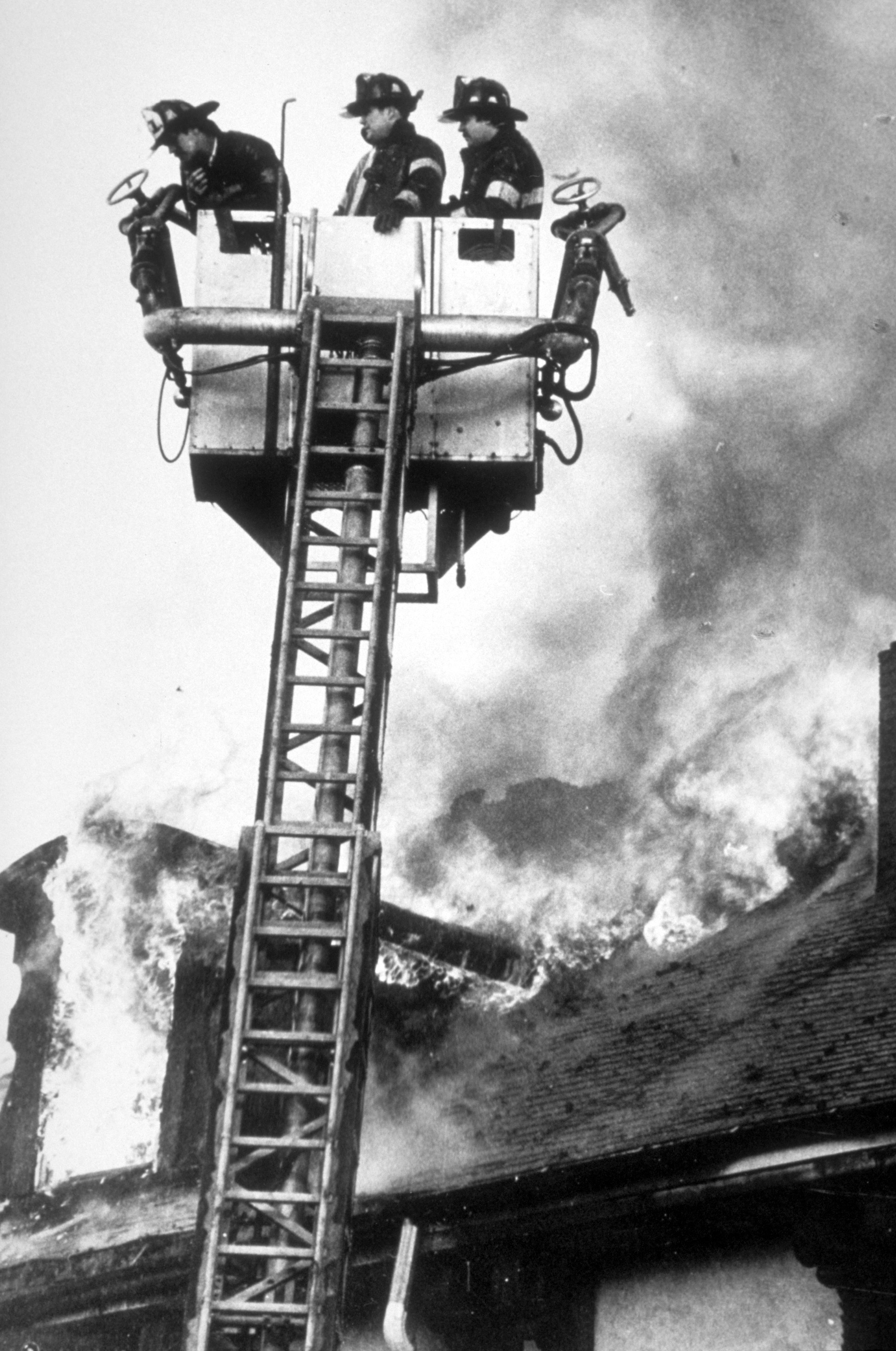 Boston firefighters battling the fire that nearly destroyed Rosie’s Place on April 29, 1984.