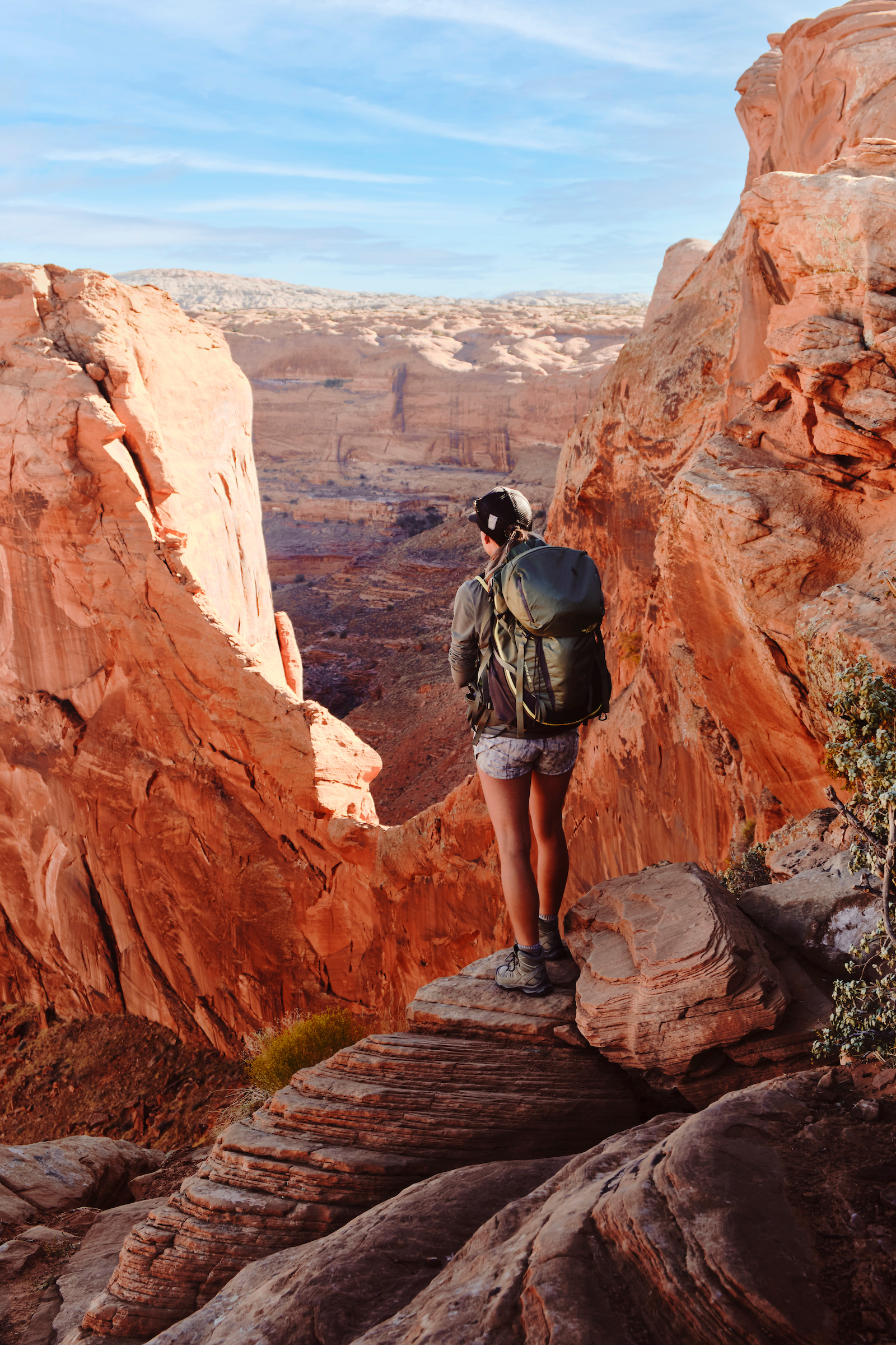 A backpacker enjoys the view of Coyote Gulch in Grand Staircase-Escalante
National Monument.