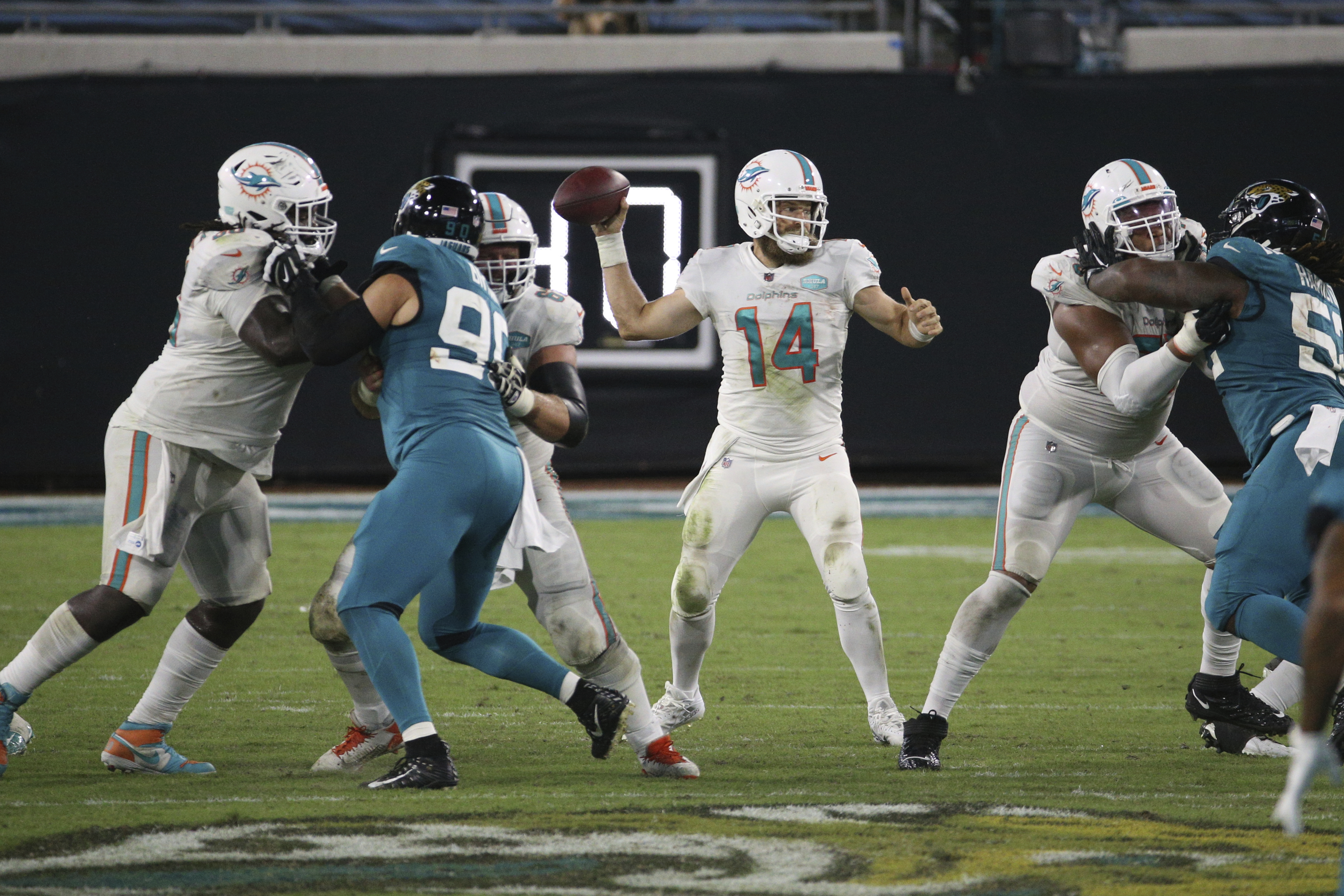 Miami Dolphins quarterback Ryan Fitzpatrick (14) throws a pass against the  New York Jets during …