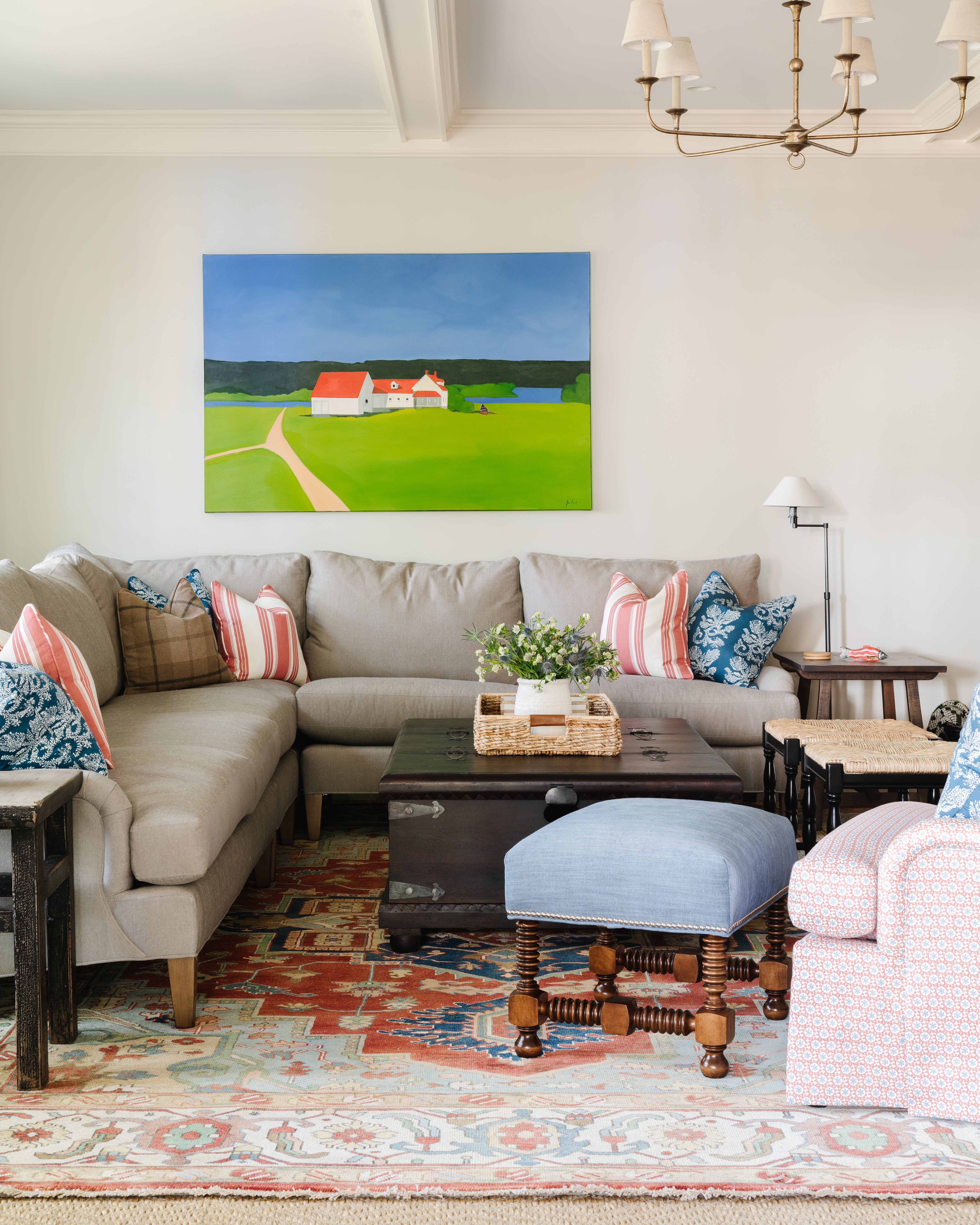 Jean Jack’s oil painting from Portland Art Gallery adds a punch of color over the Lee Industries sectional.