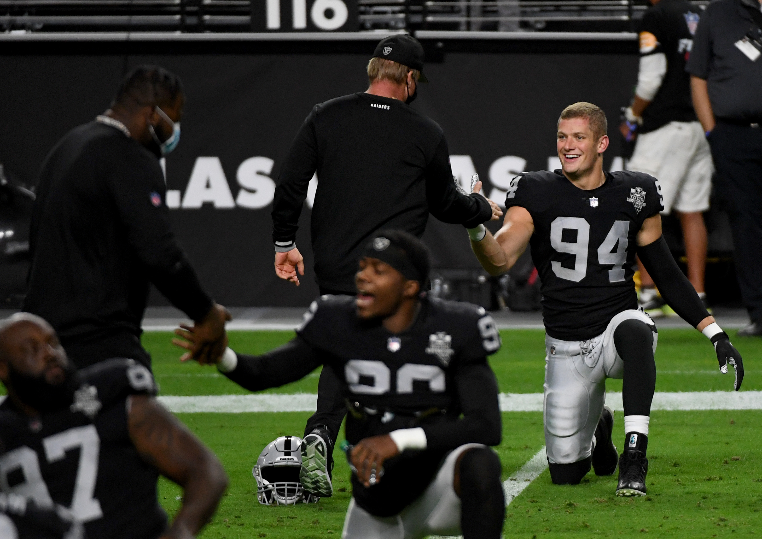 Raiders defensive end Carl Nassib (94) celebrates after beating