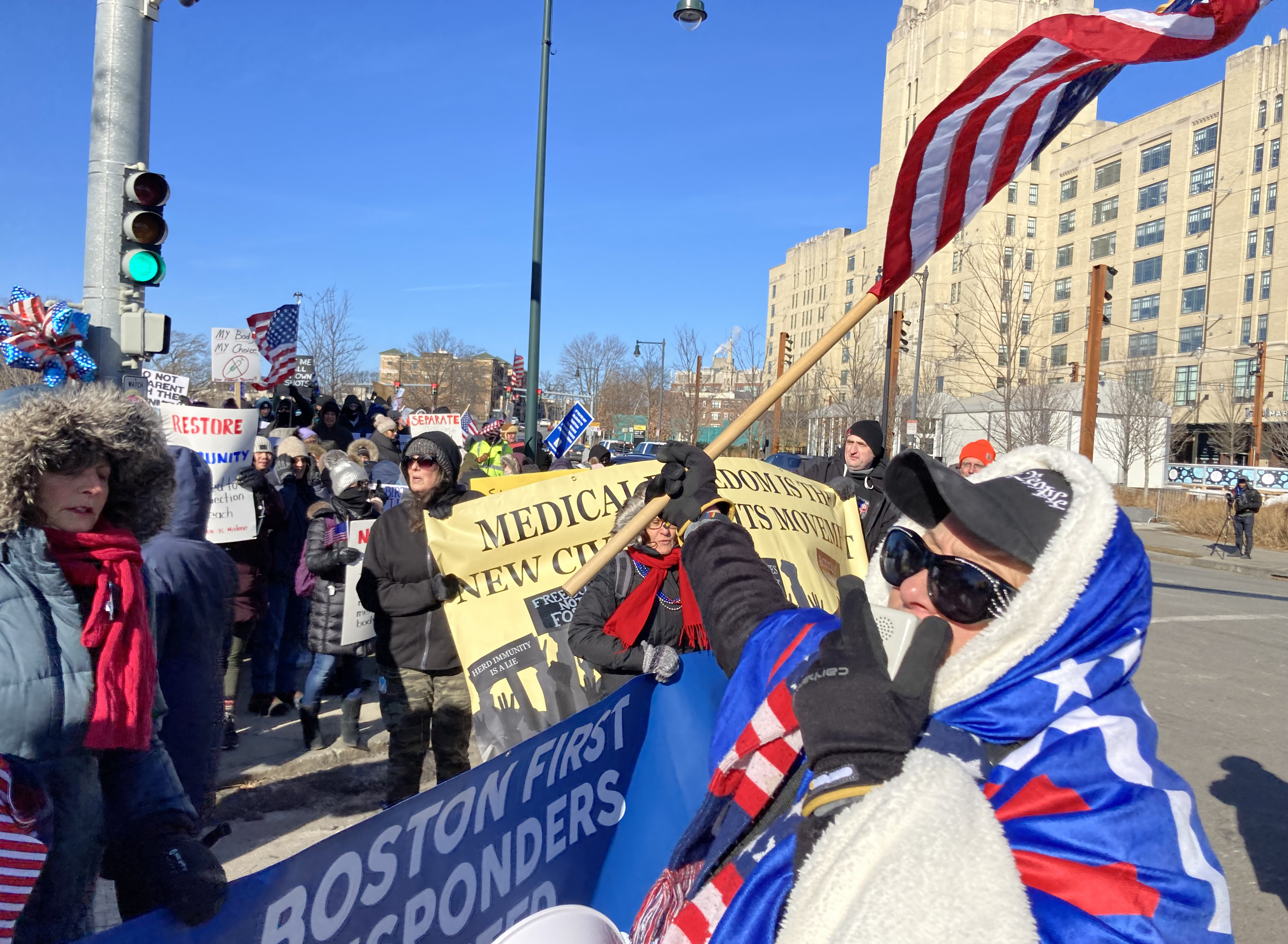 COVID-19 vaccine mandate begins in Boston amid demonstrations by