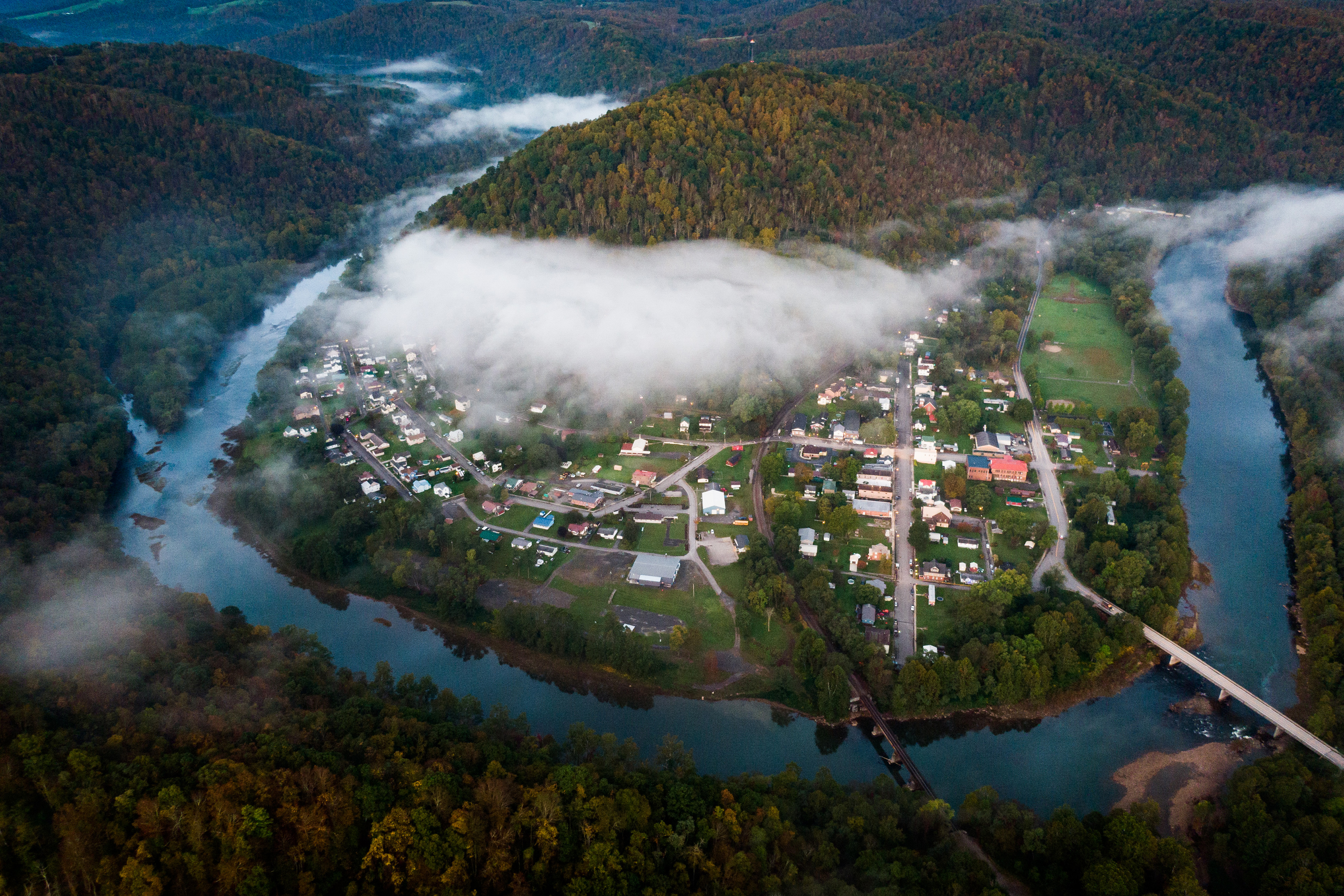 A view of Rowlesburg, W.Va., whose water system can’t handle heavy storms which sends raw sewage into the Cheat River, on Oct. 7, 2021. chin blocks Democrats’ push to reduce warming, new data shows his constituents are more exposed to worsening floods than anywhere else in the country. (Erin Schaff/The New York Times)