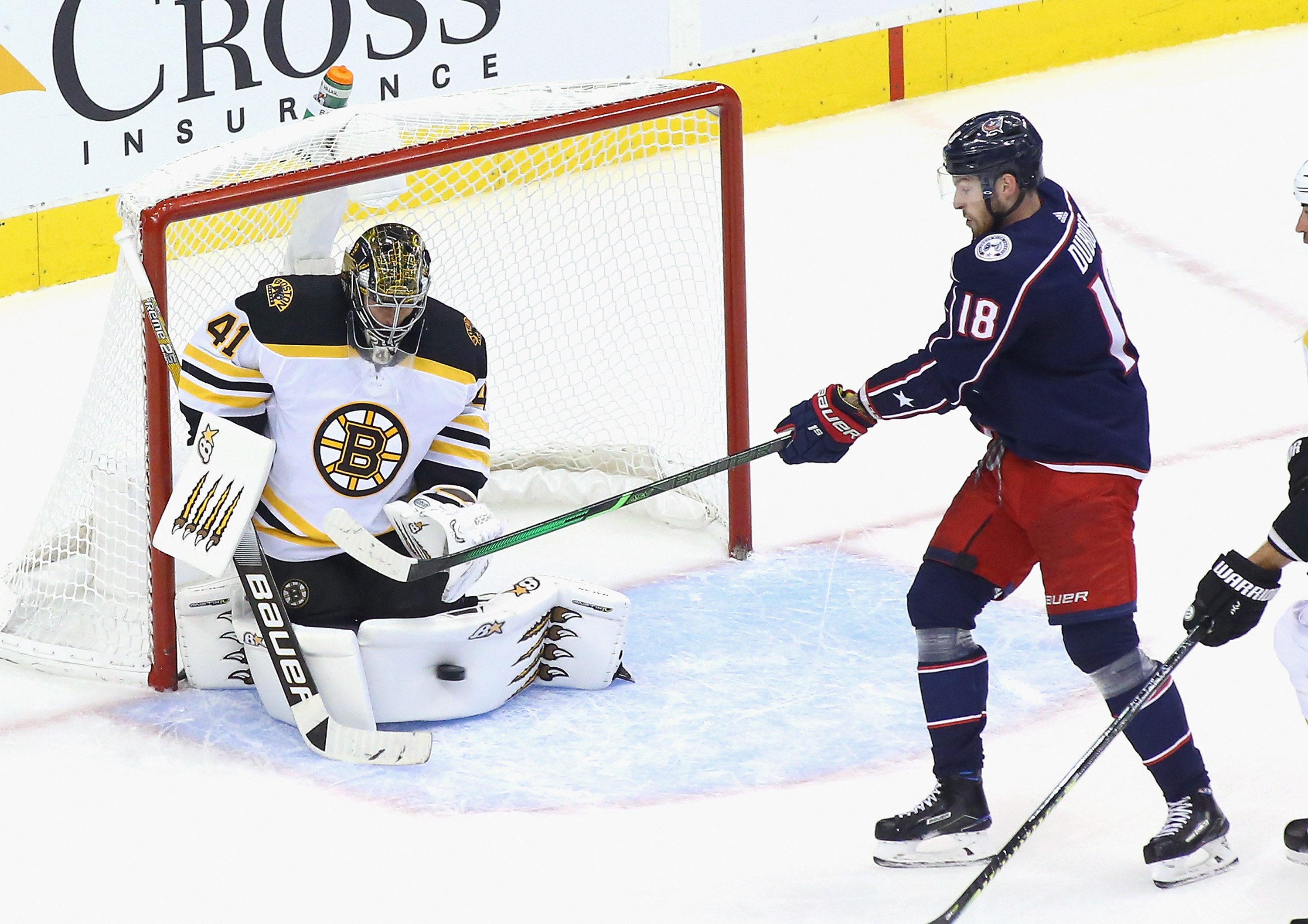 Pierre-Luc Dubois of Columbus attempts to deflect a third-period shot past Jaroslav Halak on Thursday.