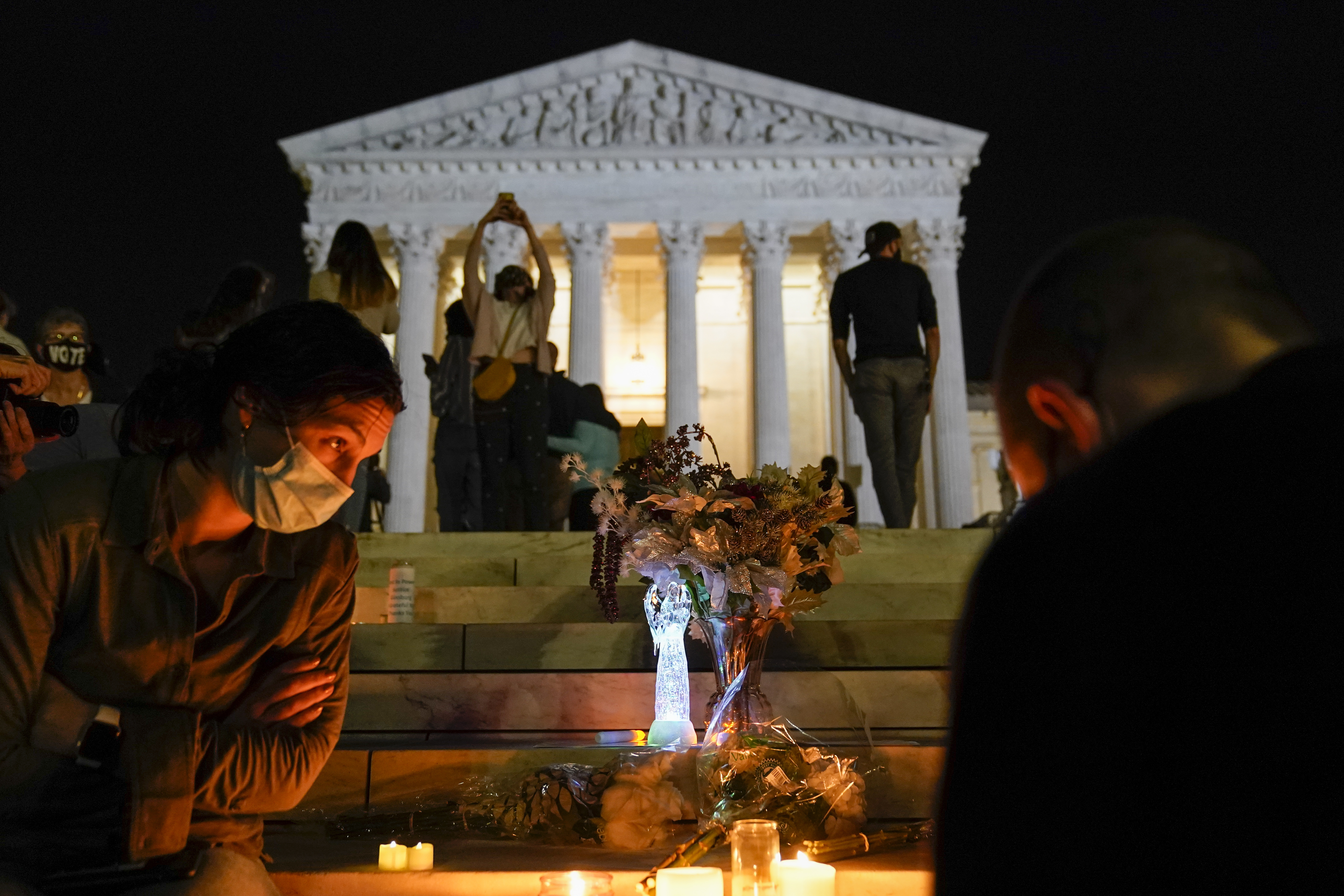 People gathered at the Supreme Court Friday in Washington after the Supreme Court announced that Supreme Court Justice Ruth Bader Ginsburg died of metastatic pancreatic cancer at age 87.
