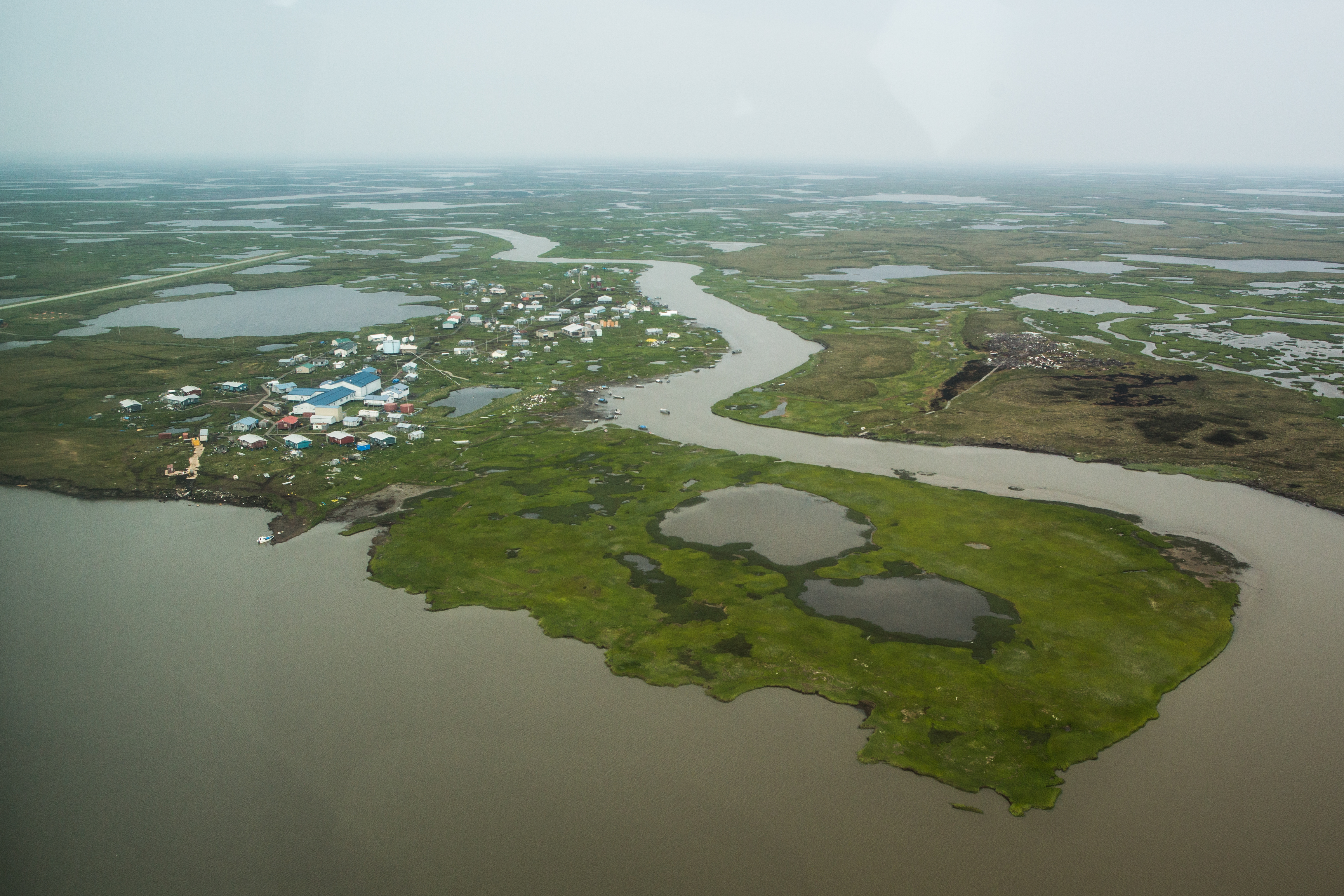 Newtok, Alaska, as seen from a plane in 2015. A replacement village called Mertavik is slowly taking shape nine miles away.