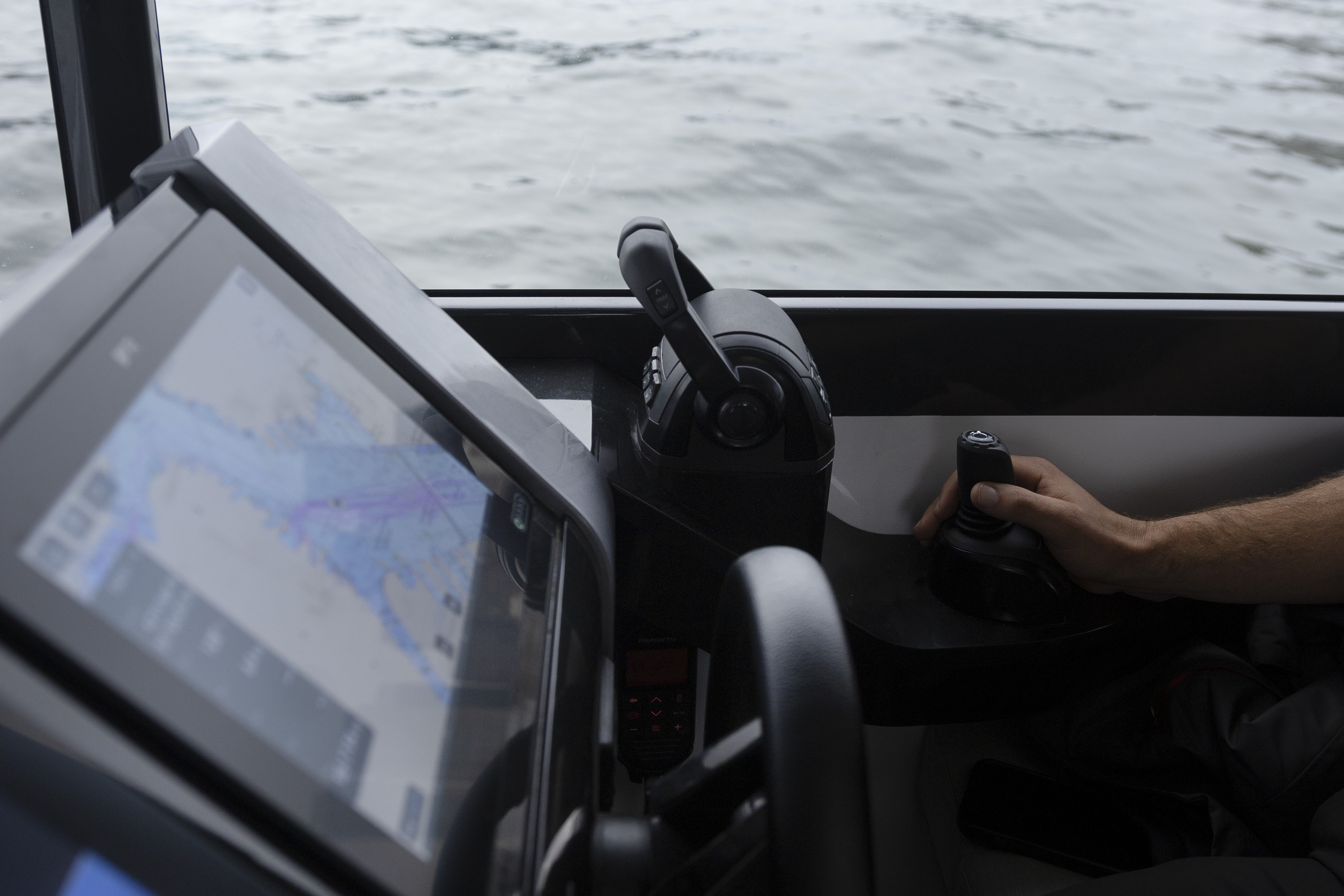 Navier takes electric-powered boat for a glide on Boston Harbor