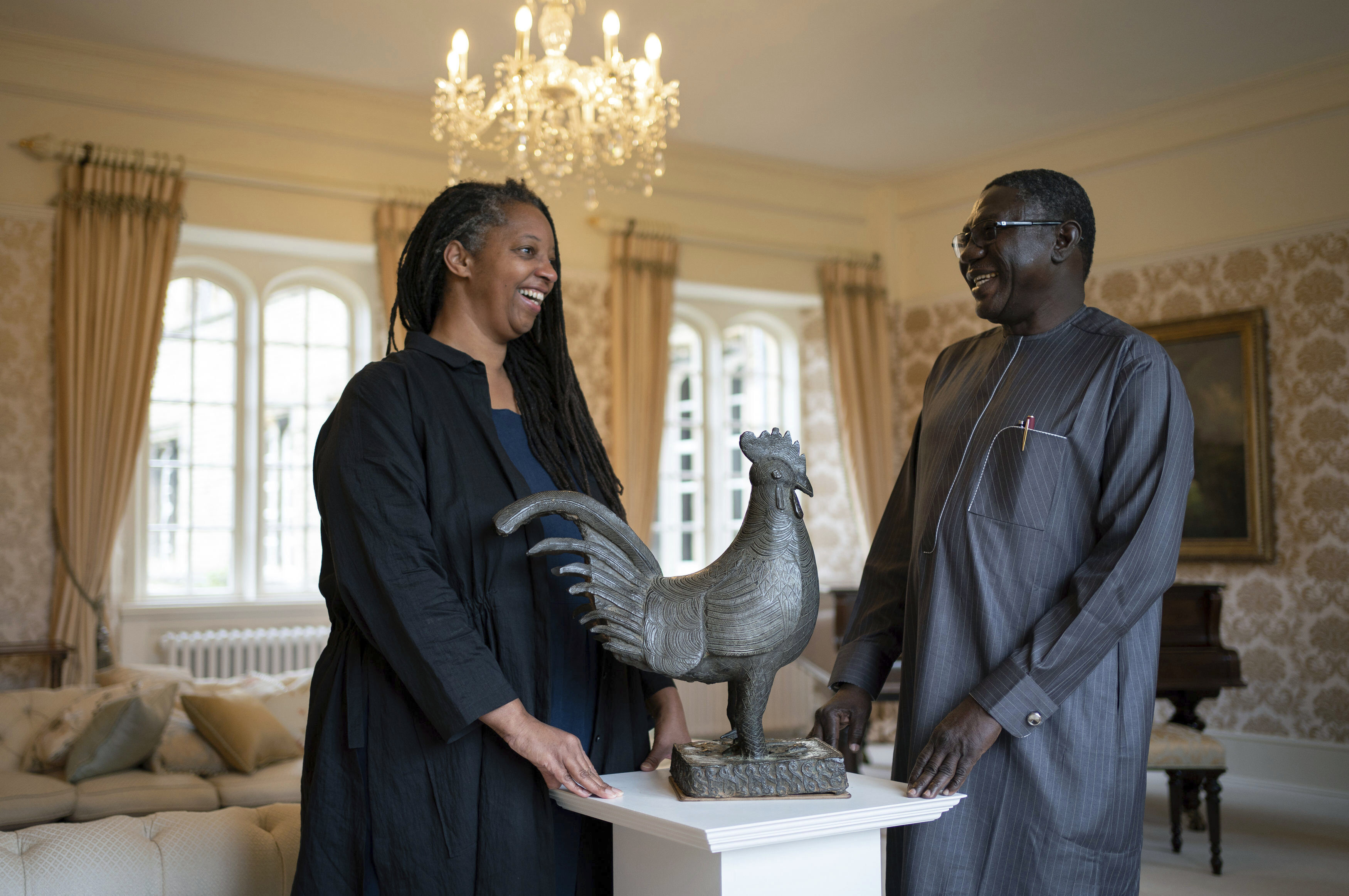 Master of Jesus College Sonita Alleyne (left) and Abba Isa Tijani, director general of Nigeria's National Commission for Museums and Monuments,  spoke before a transfer ceremony for the looted bronze cockerel, known as the Okukur, to Nigeria. 