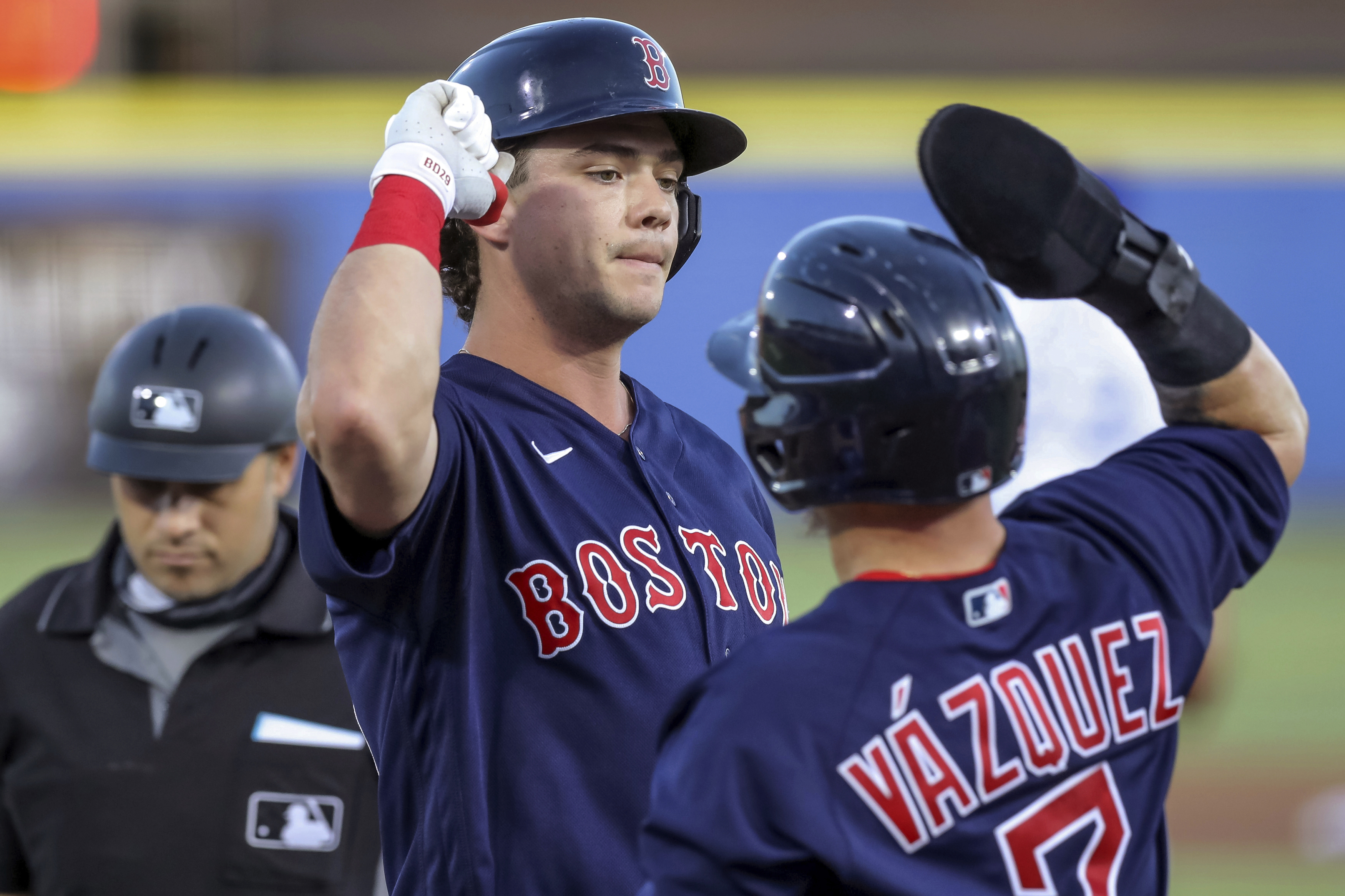 Bobby Dalbec celebrates his fifth homer of the season Thursday night with teammate Christian Vazquez.