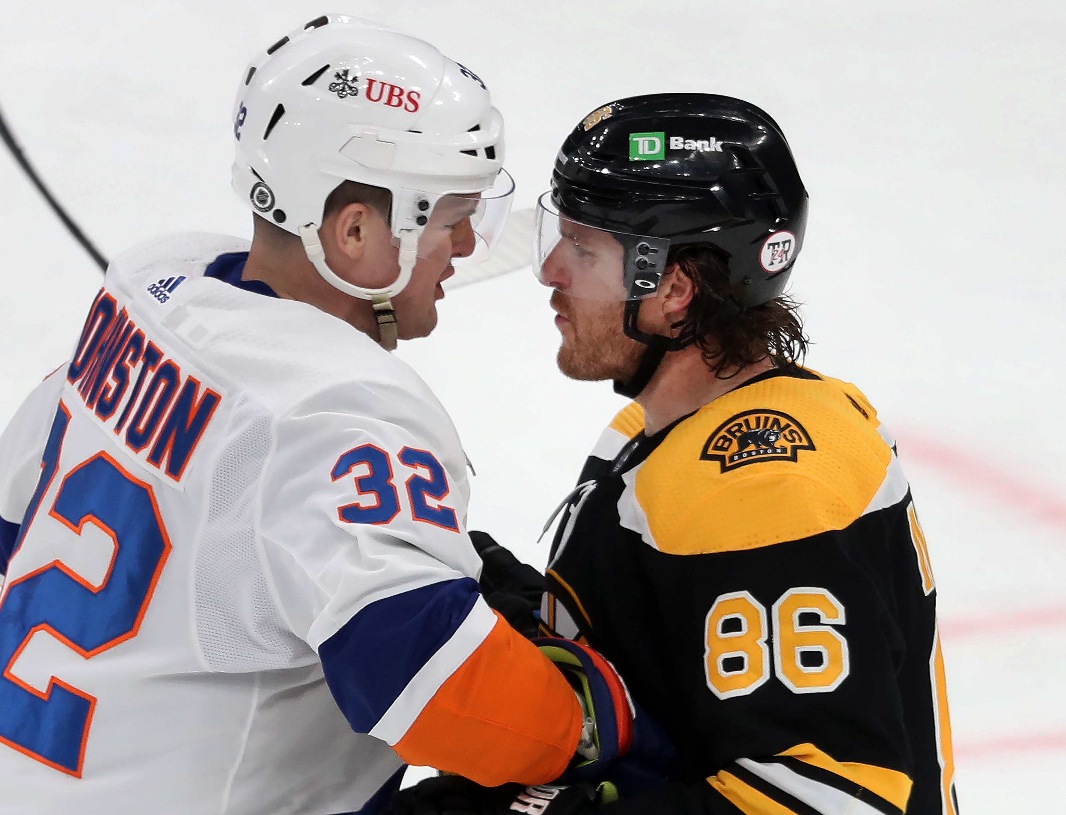 New York's Ross Johnston and Kevan Miller get some face time together in the second period of Monday's game.
