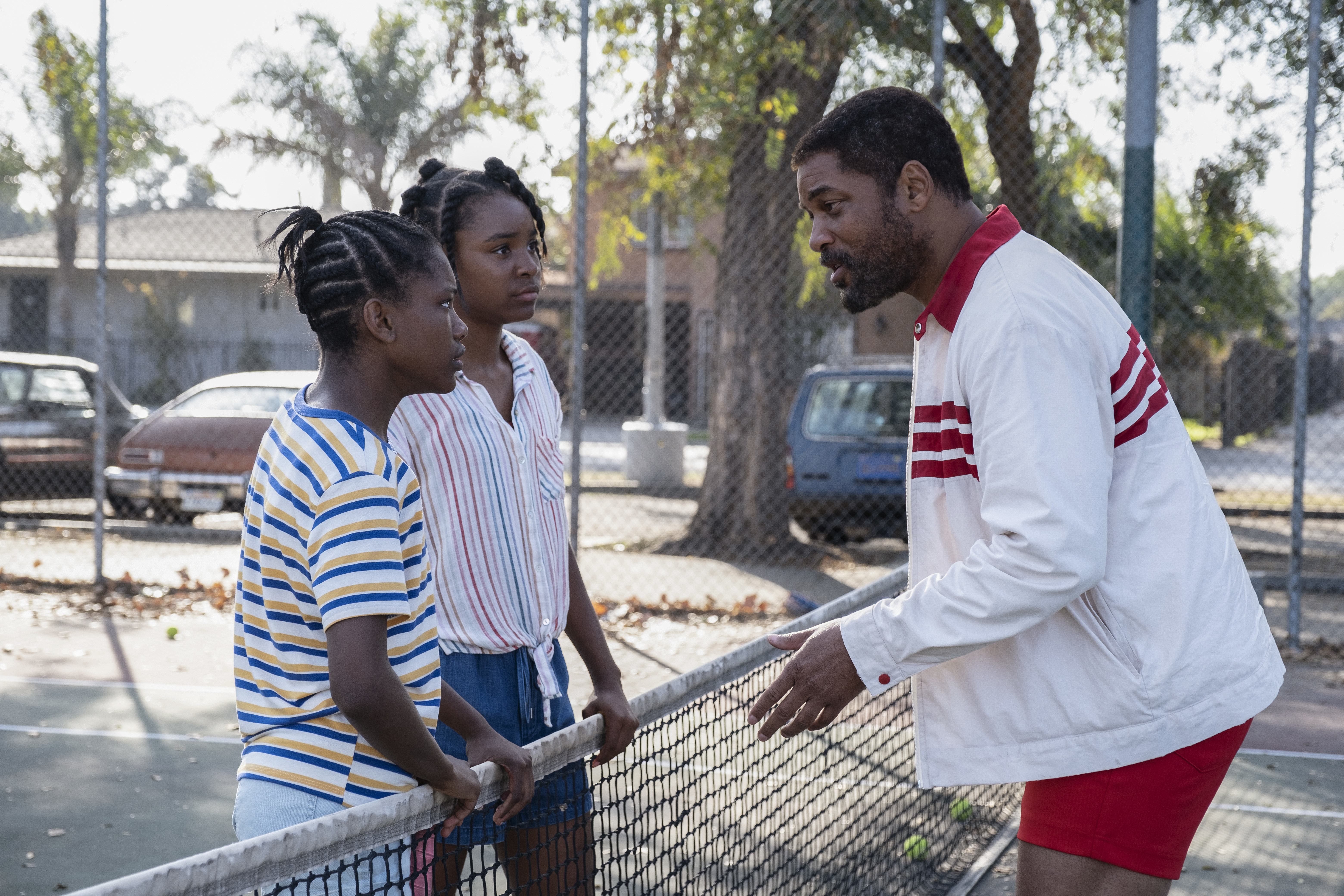 From left: Demi Singleton, Saniyya Sidney, and Will Smith in "King Richard."