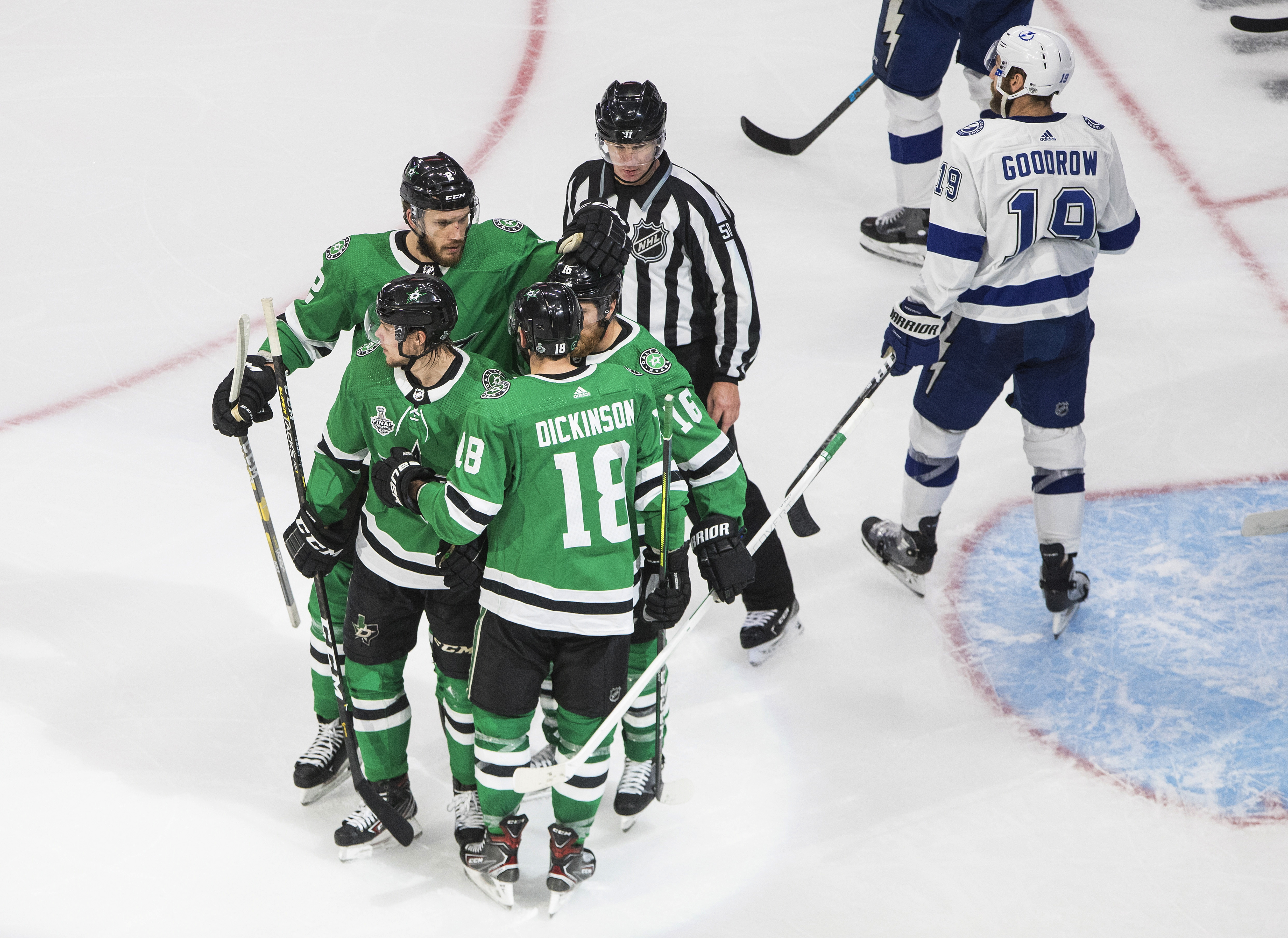 Dallas Miro Heiskanen celebrates his goal with Jamie Oleksiak (No. 2), Jason Dickinson (No. 18) and Joe Pavelski (No. 16) in Game 3 Wednesday night.