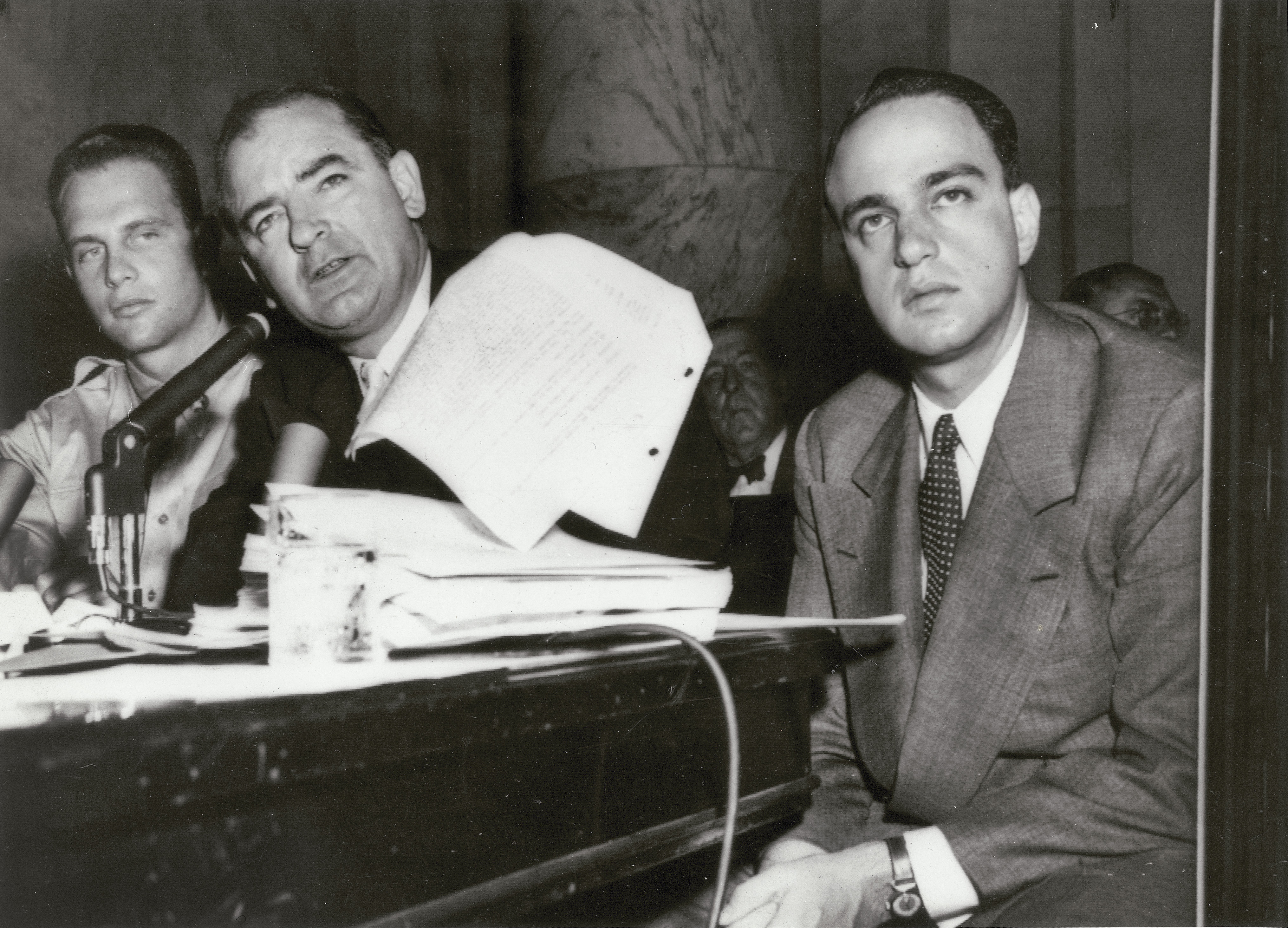 McCarthy (center) with aide Roy Cohn (right) and adviser G. David Schine at the Army-McCarthy hearings.