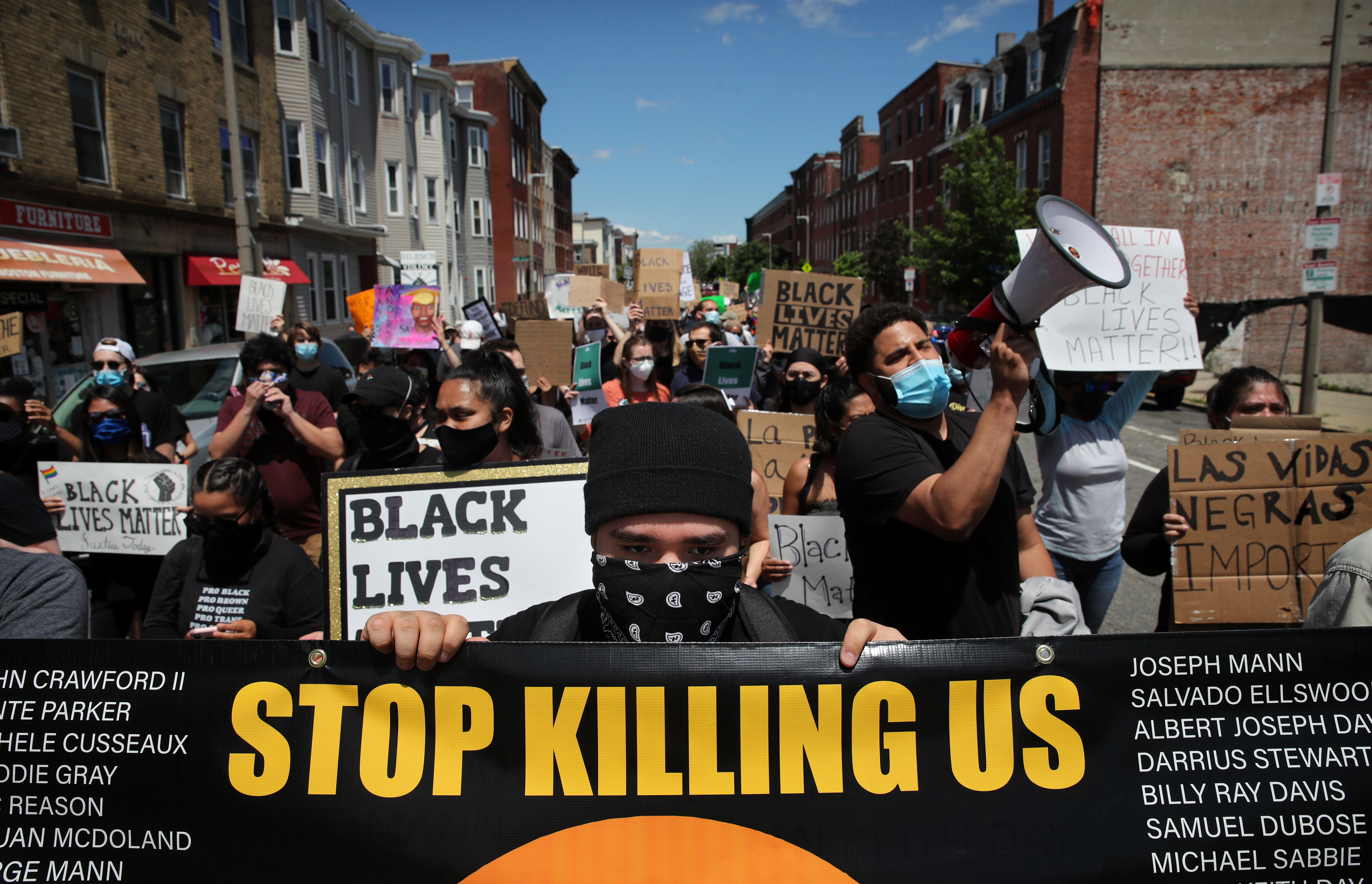Chris Martinez and others marched during a Black Lives Matters protest in East Boston on Saturday.