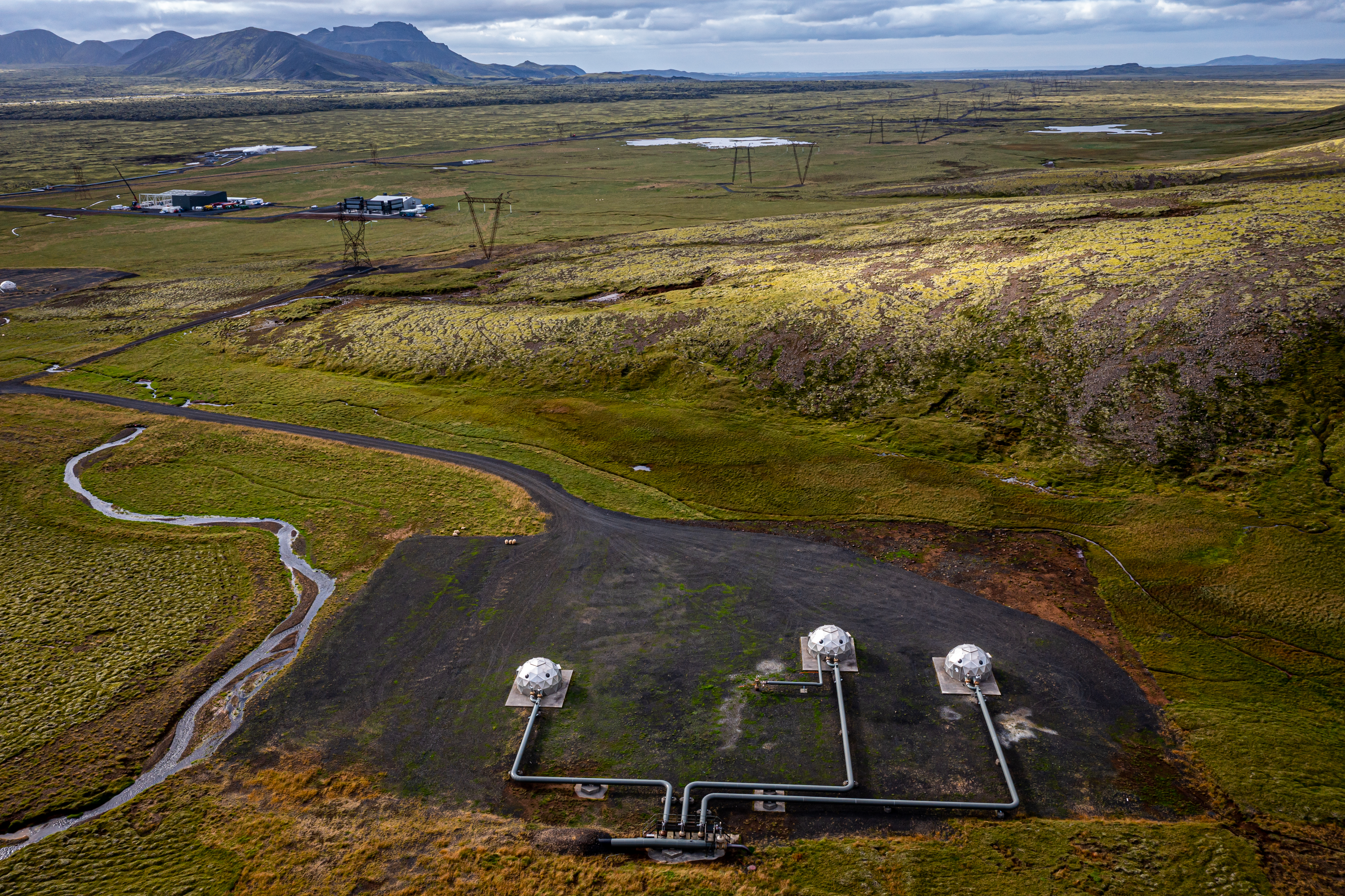 Geodesic domes, beneath which trapped CO2 is injected into the ground, surround the Orca Plant.