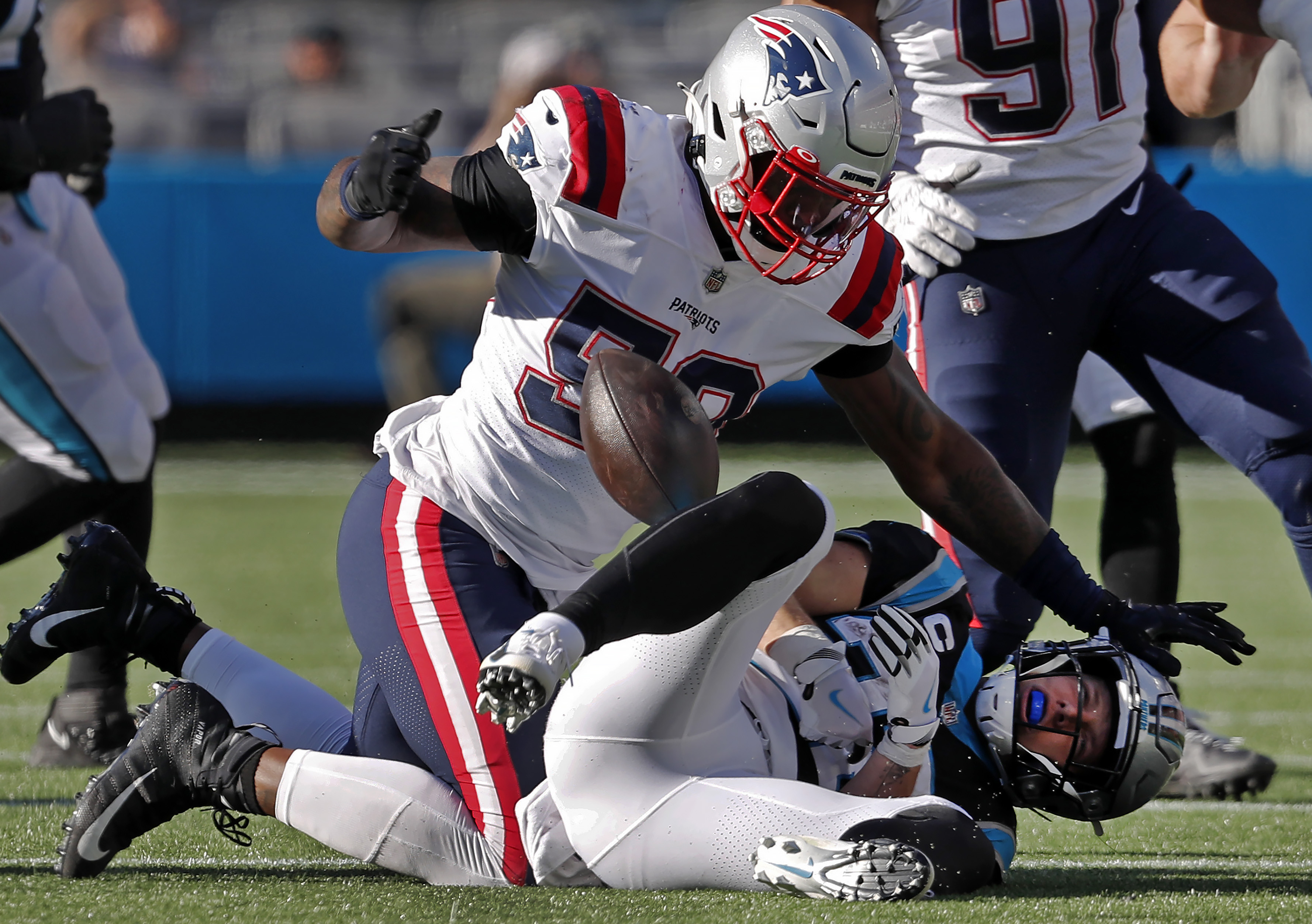 New England Patriots linebacker Jamie Collins warms up during an NFL  football practice, Wednesday, Sept. 18, 2019, in Foxborough, Mass. As  dominant as the Patriots' offense has been through two games, their