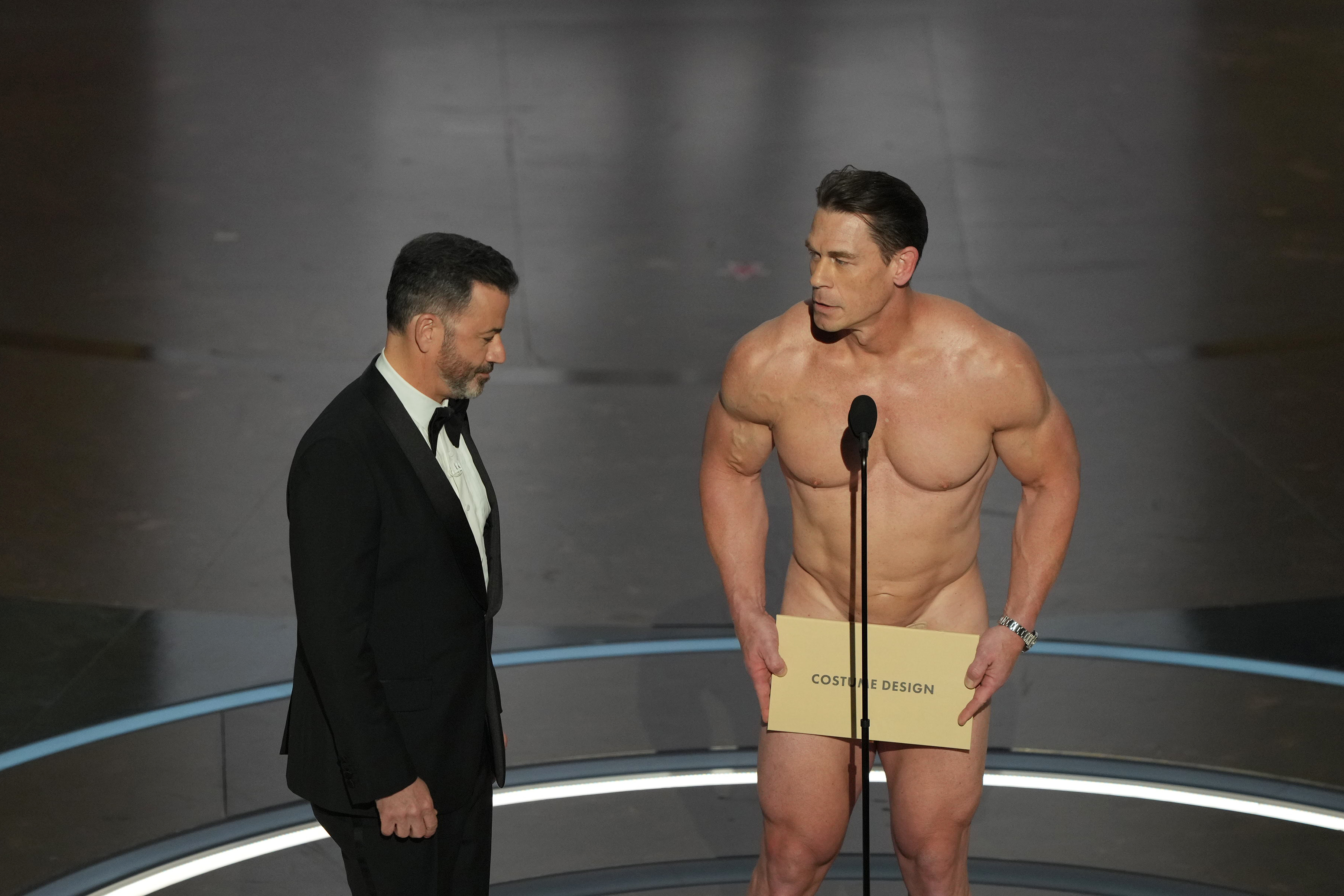 Oscars John Cena: Watch star strip down for award appearance