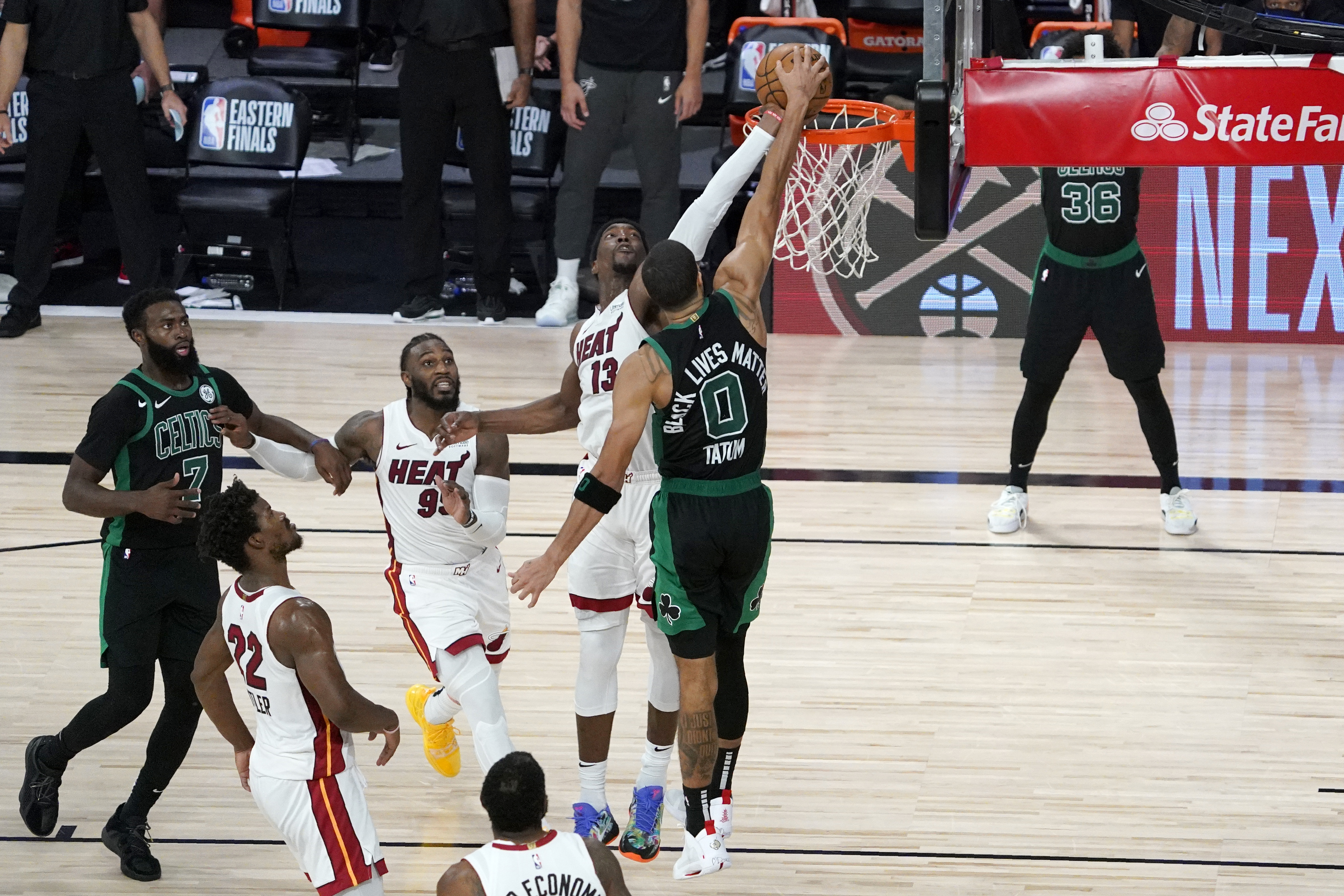 Bam Adebayo blocks Jayson Tatum in overtime of Tuesday's game.