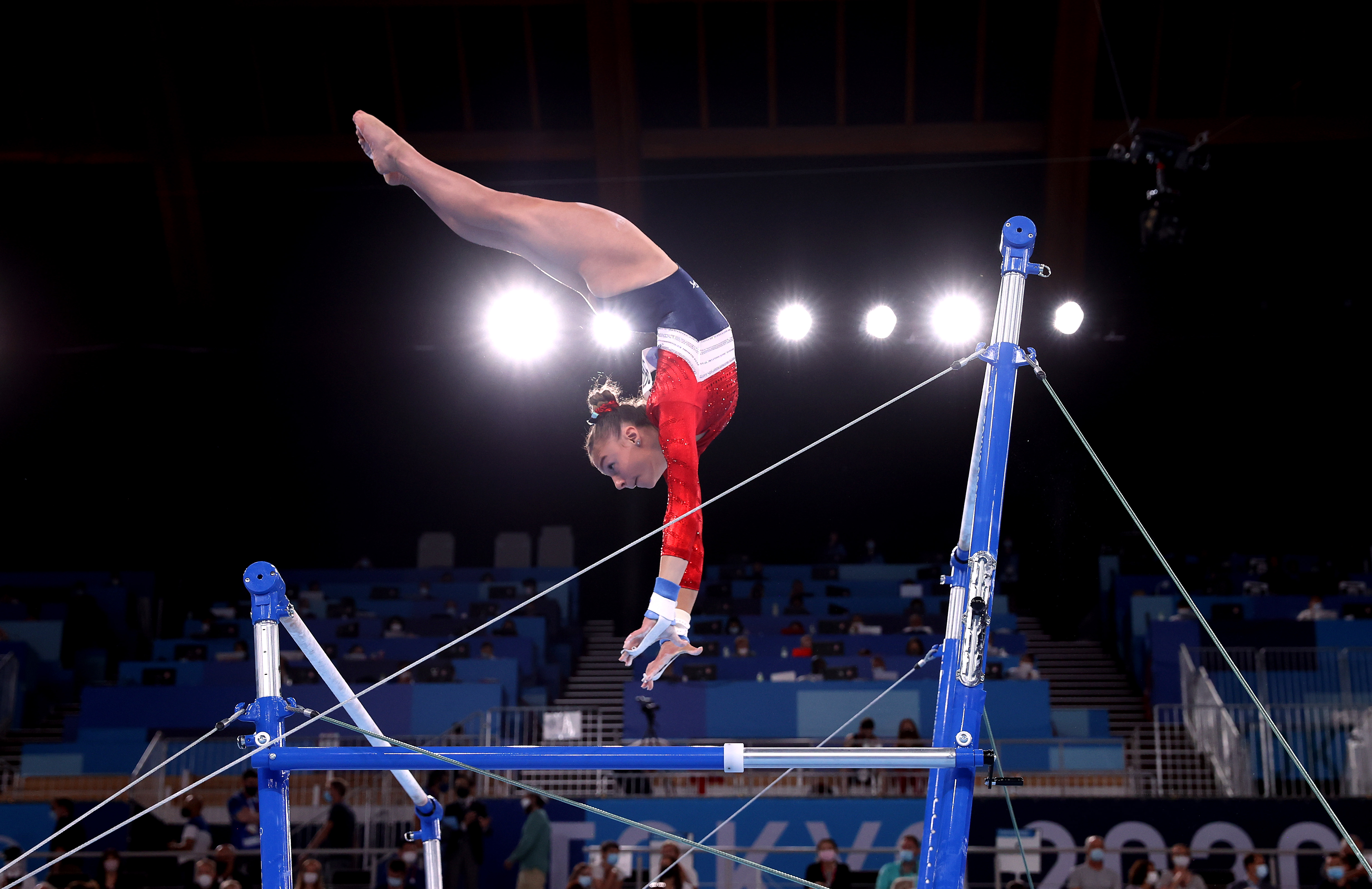 Grace McCallum takes her spin on the uneven bars.