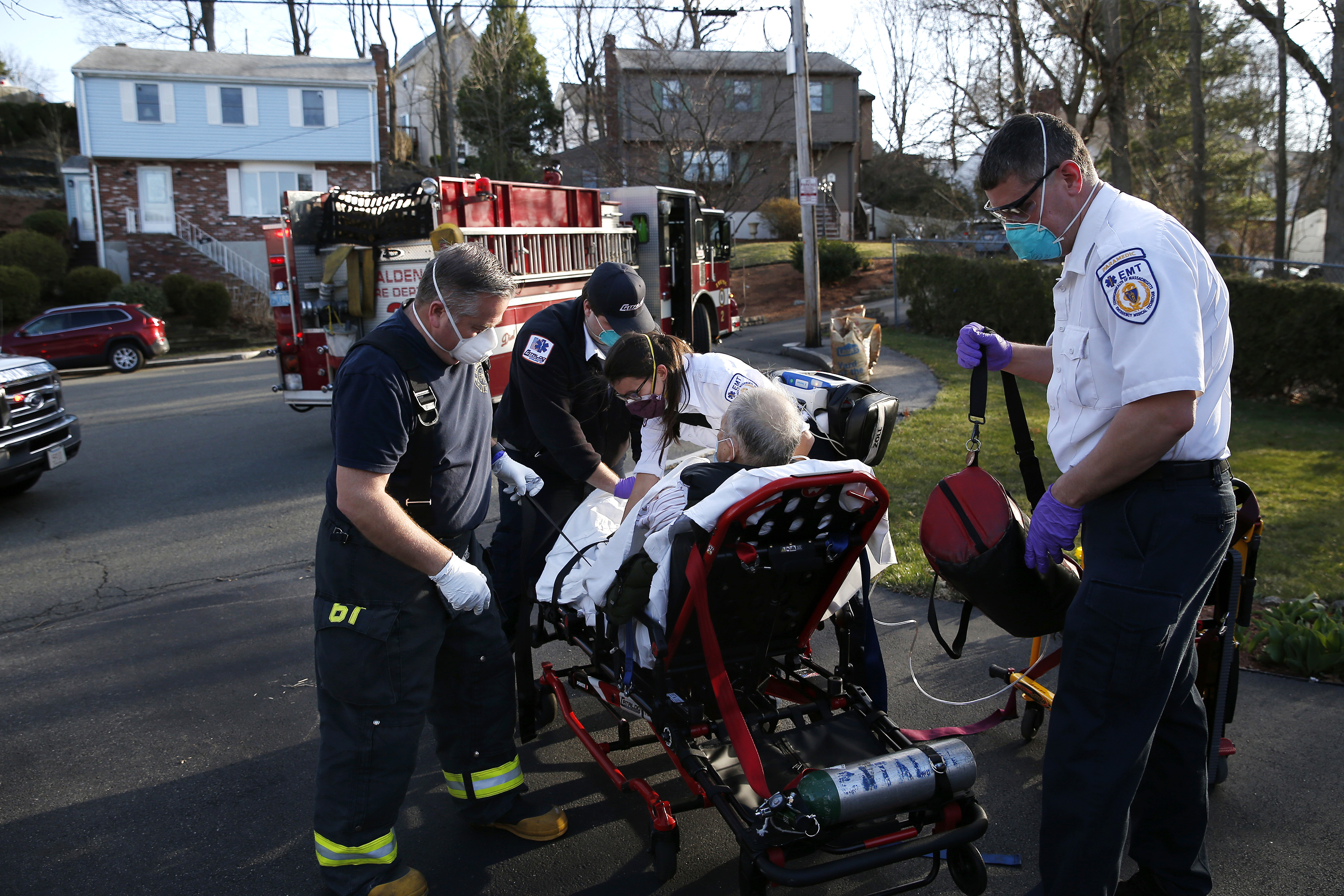 Monday, 5:36 p.m. As Emily secured a patient to a stretcher, a woman inside the home called out to say that he doesn’t have the coronavirus because he hasn’t had a fever.