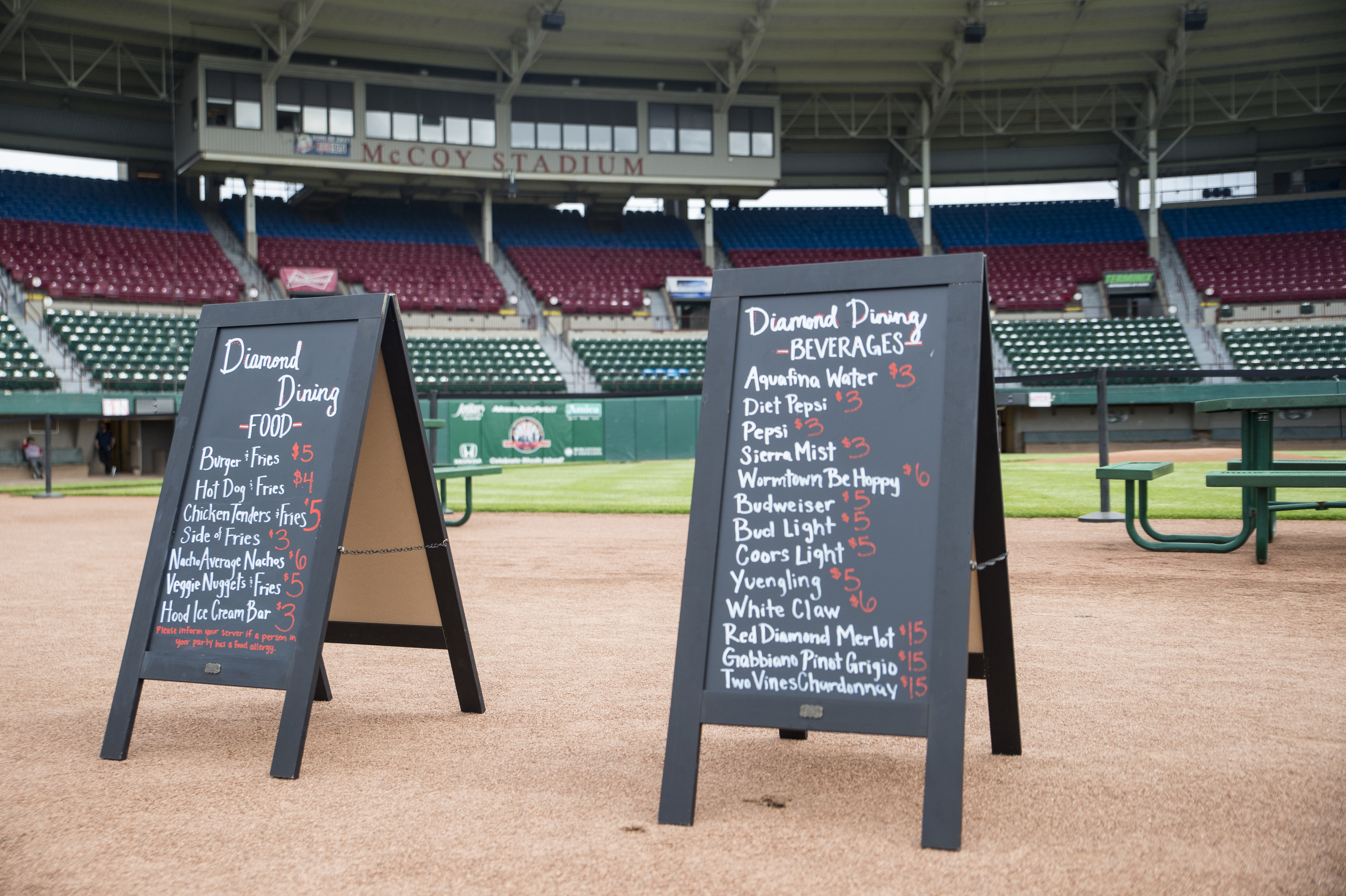 Menu boards sat on the McCoy Stadium infield.
